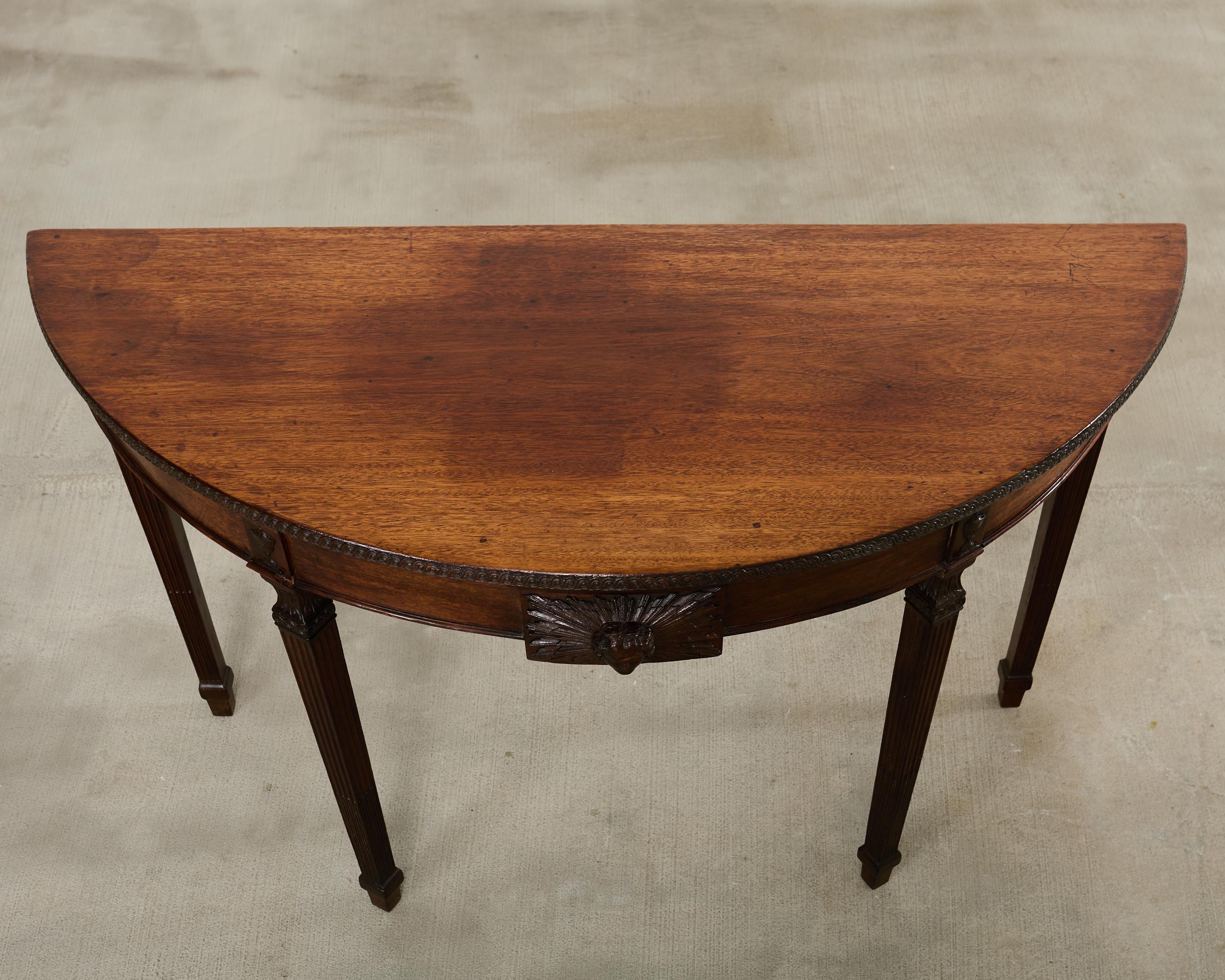 18th Century and Earlier Pair of Italian Neoclassical Walnut Apollo Sunburst Demilunes For Sale