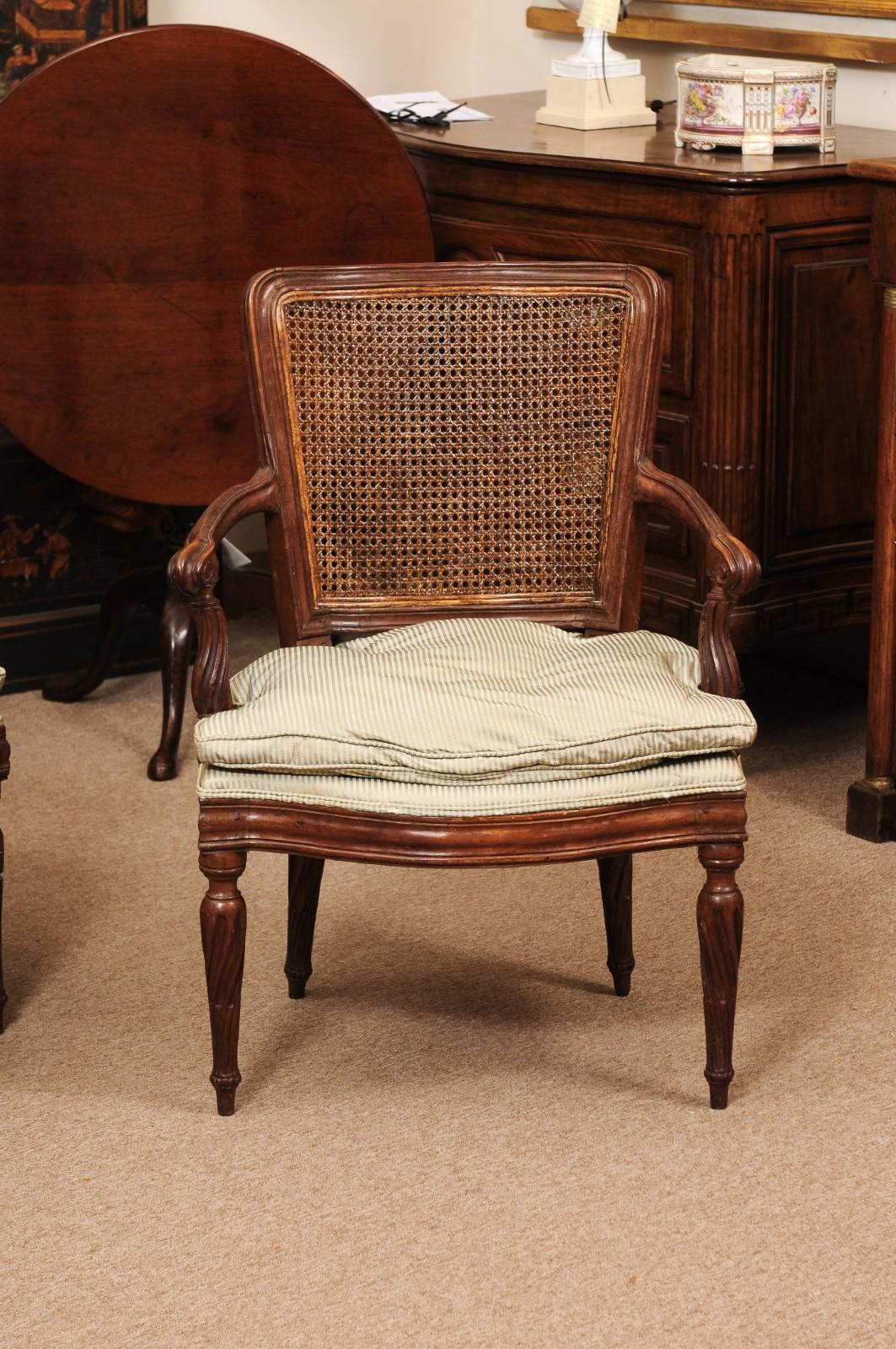 Late 18th Century Pair of Italian Neoclassical Walnut Fauteuils with Cane Backs For Sale