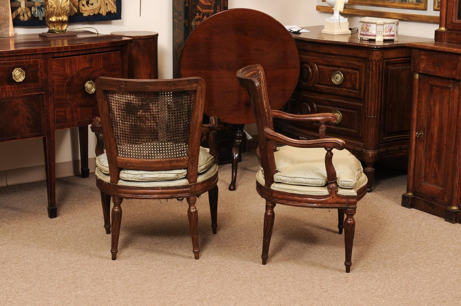 Pair of Italian Neoclassical Walnut Fauteuils with Cane Backs For Sale 4