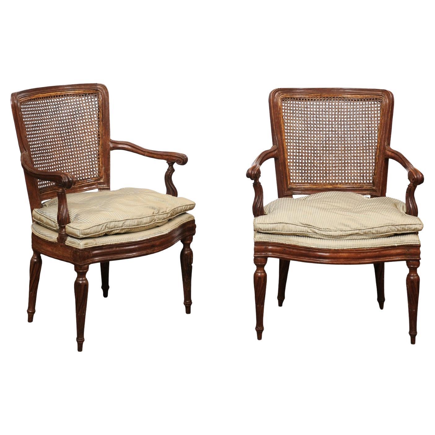 Pair of Italian Neoclassical Walnut Fauteuils with Cane Backs