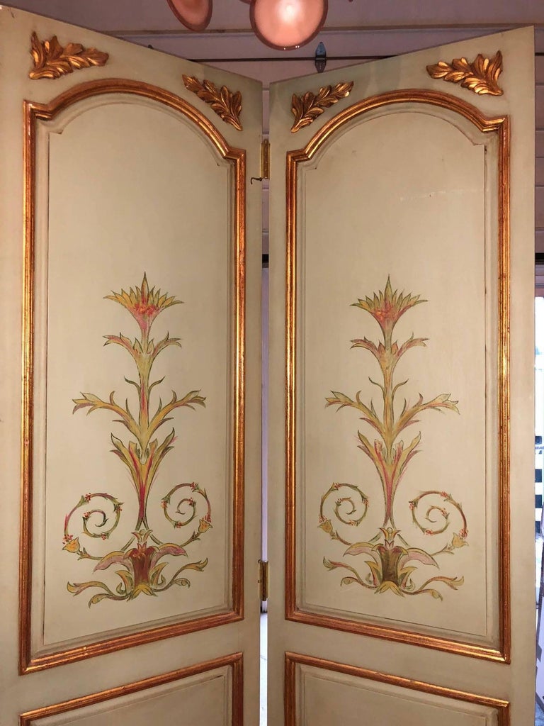 Pair of Italian Paint Decorated and Parcel-Gilt Monumental ...