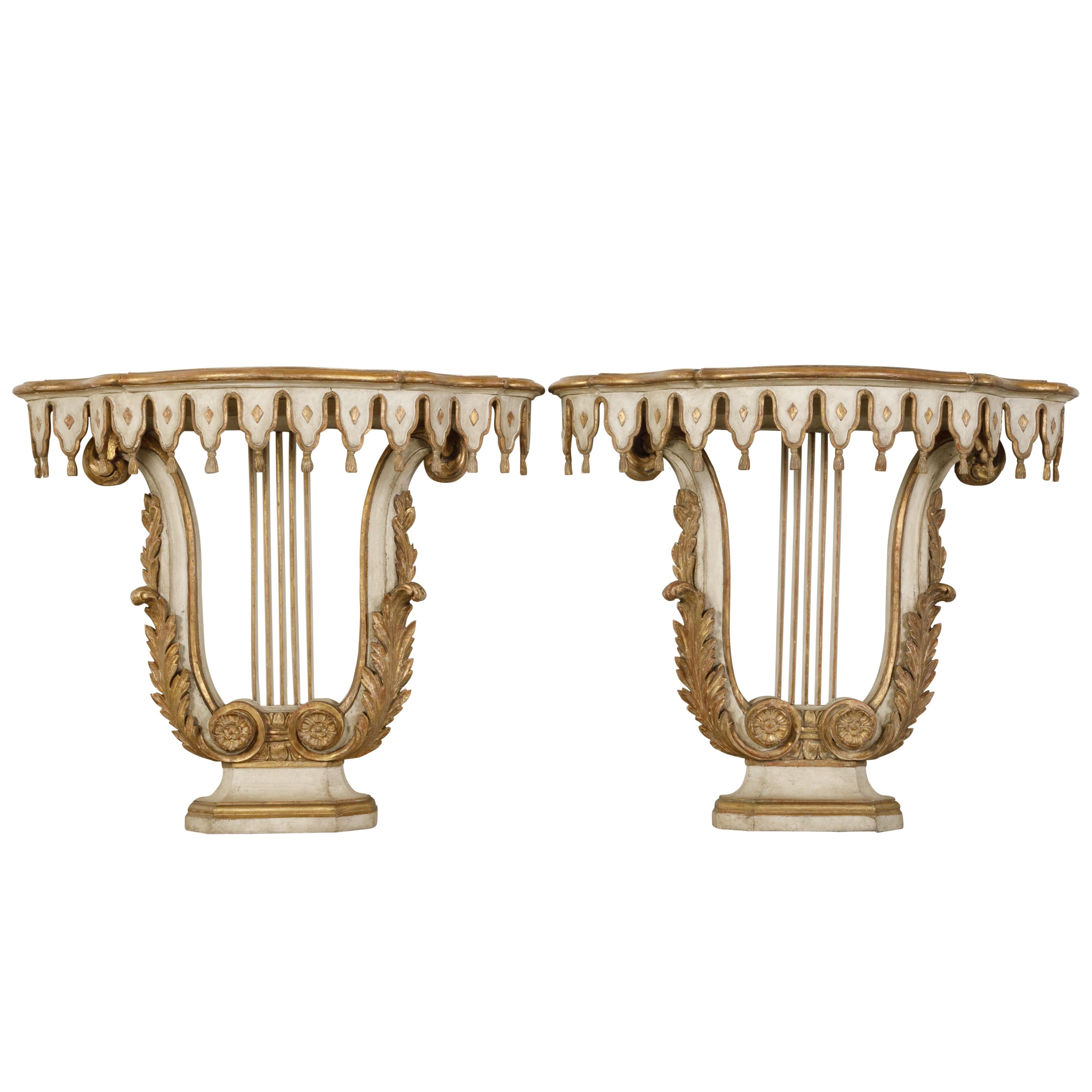 Pair of Italian Painted and Gilded Demilune Console Tables with Lyre Bases For Sale