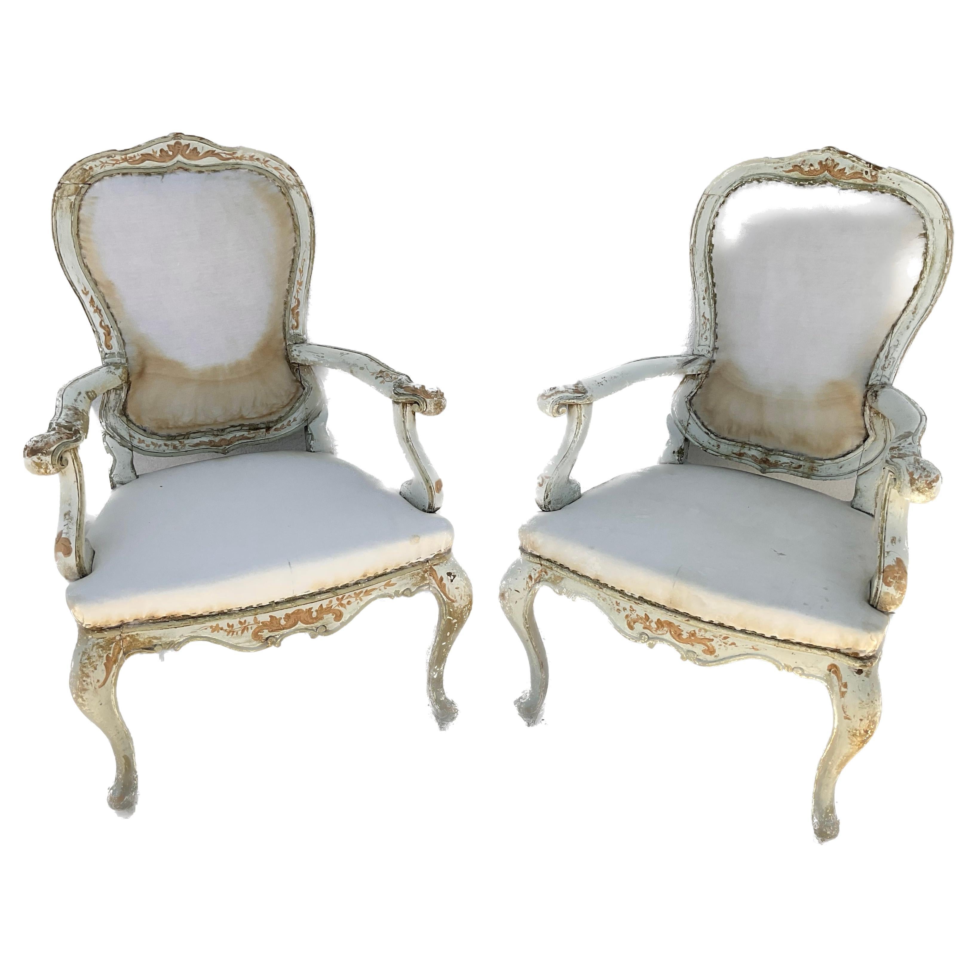 Pair of Italian Painted and Parcel Gilt Open Armchairs