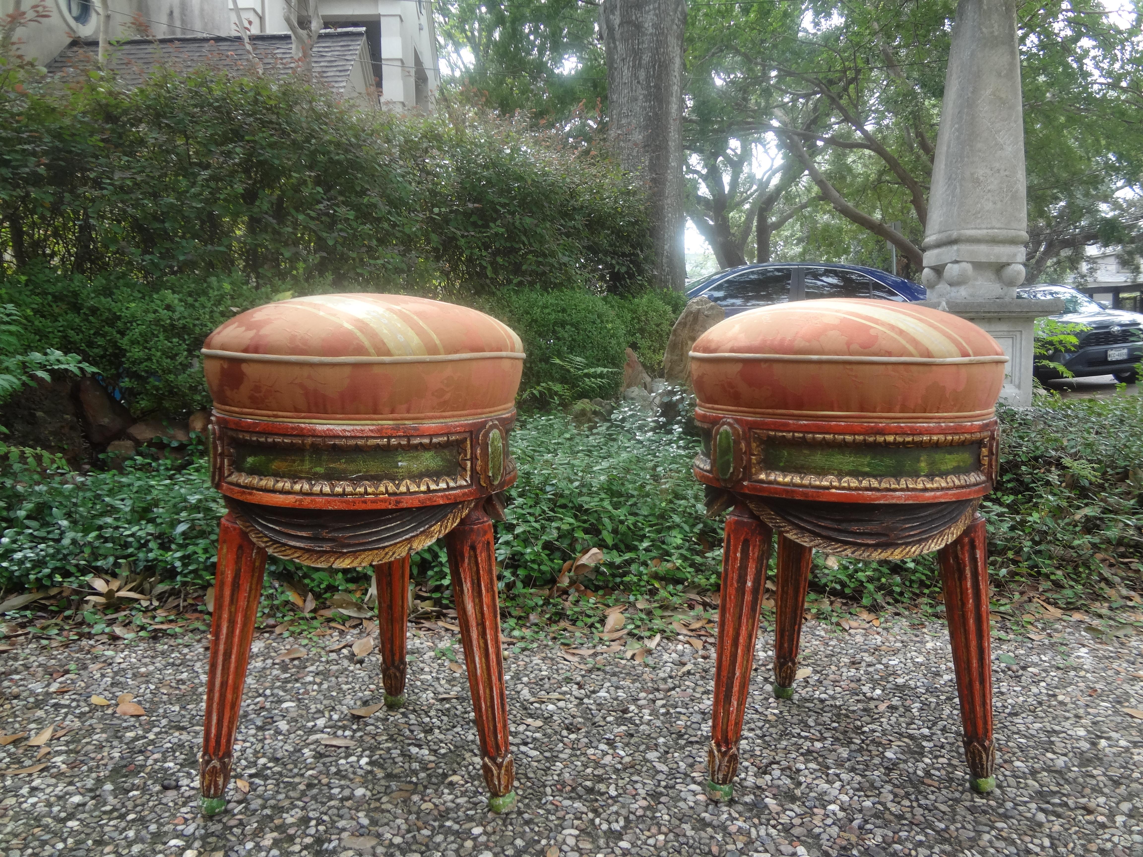 Pair Of Italian Painted Draped Poufs.
Our pair of Italian draped poufs or ottomans are paint decorated lovely shades of Tuscan colors as they hail from the Florence area of Italy. These poufs, ottomans or stools would look great under a console