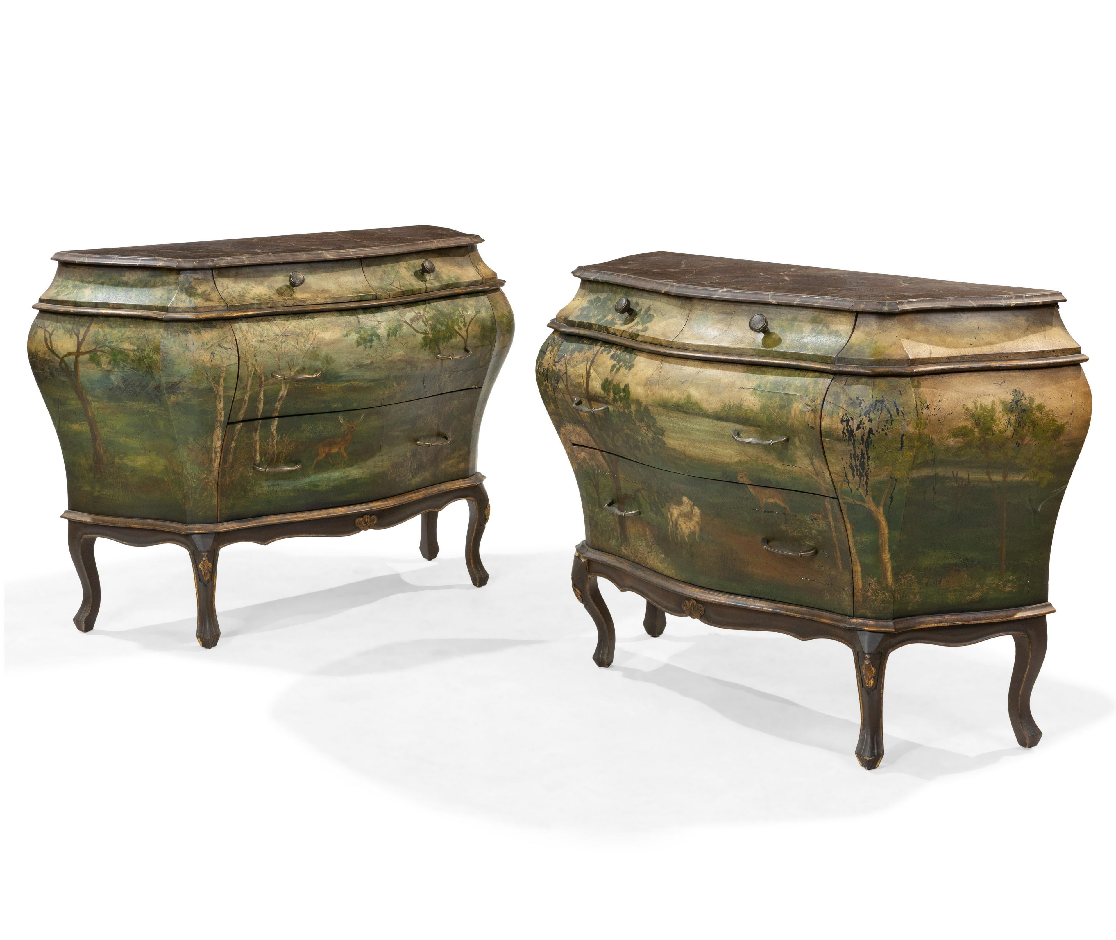 Pair of Italian painted faux marble-top Bombay commodes or nightstands. A finely hand painted pair of commodes or night tables each having a faux painted marble top with Bombay form cases each having Wonderfully painted forest scene with deer, sheep