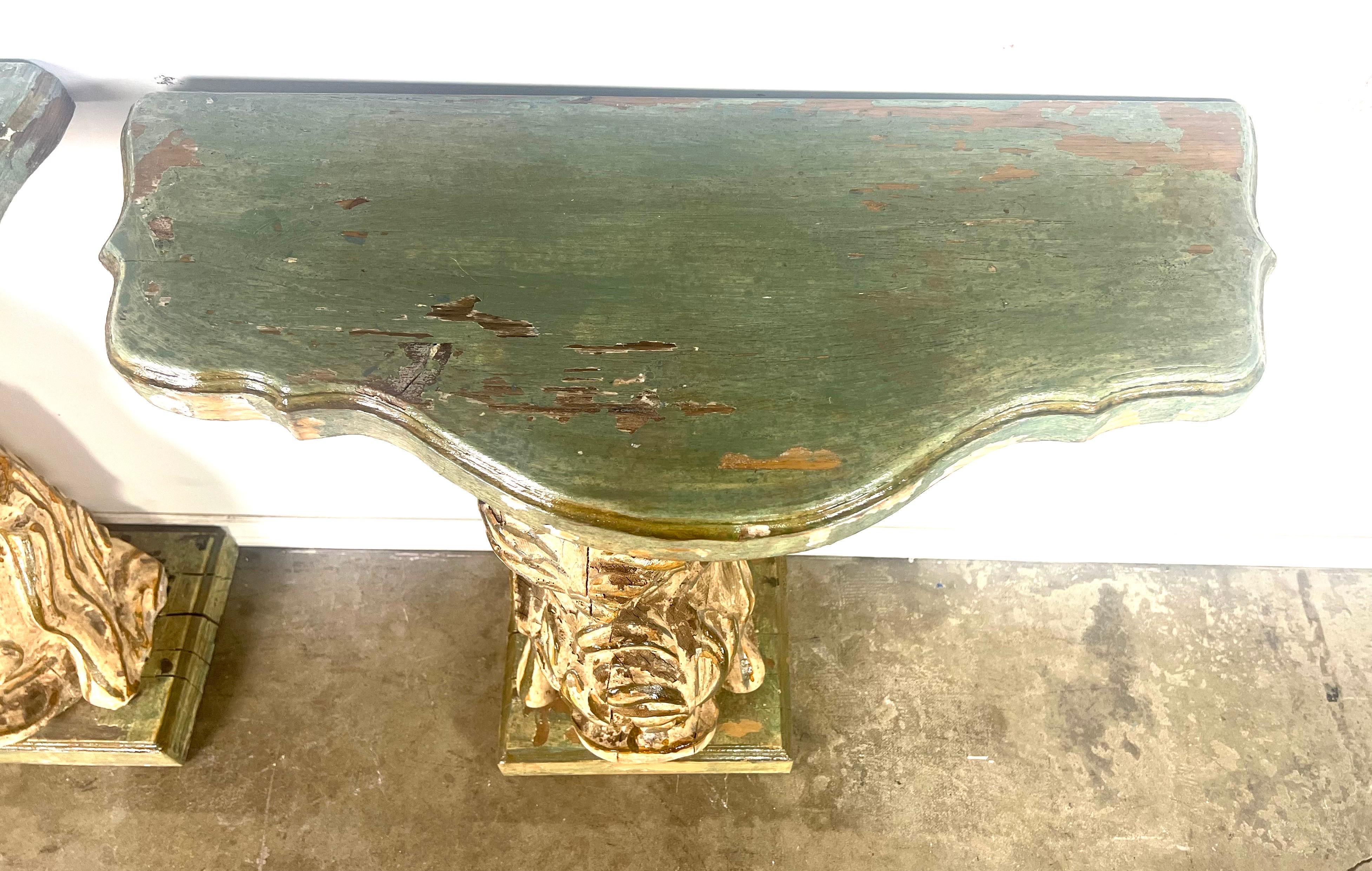 Pair of Italian Painted & Gilt Wood Consoles In Distressed Condition For Sale In Los Angeles, CA