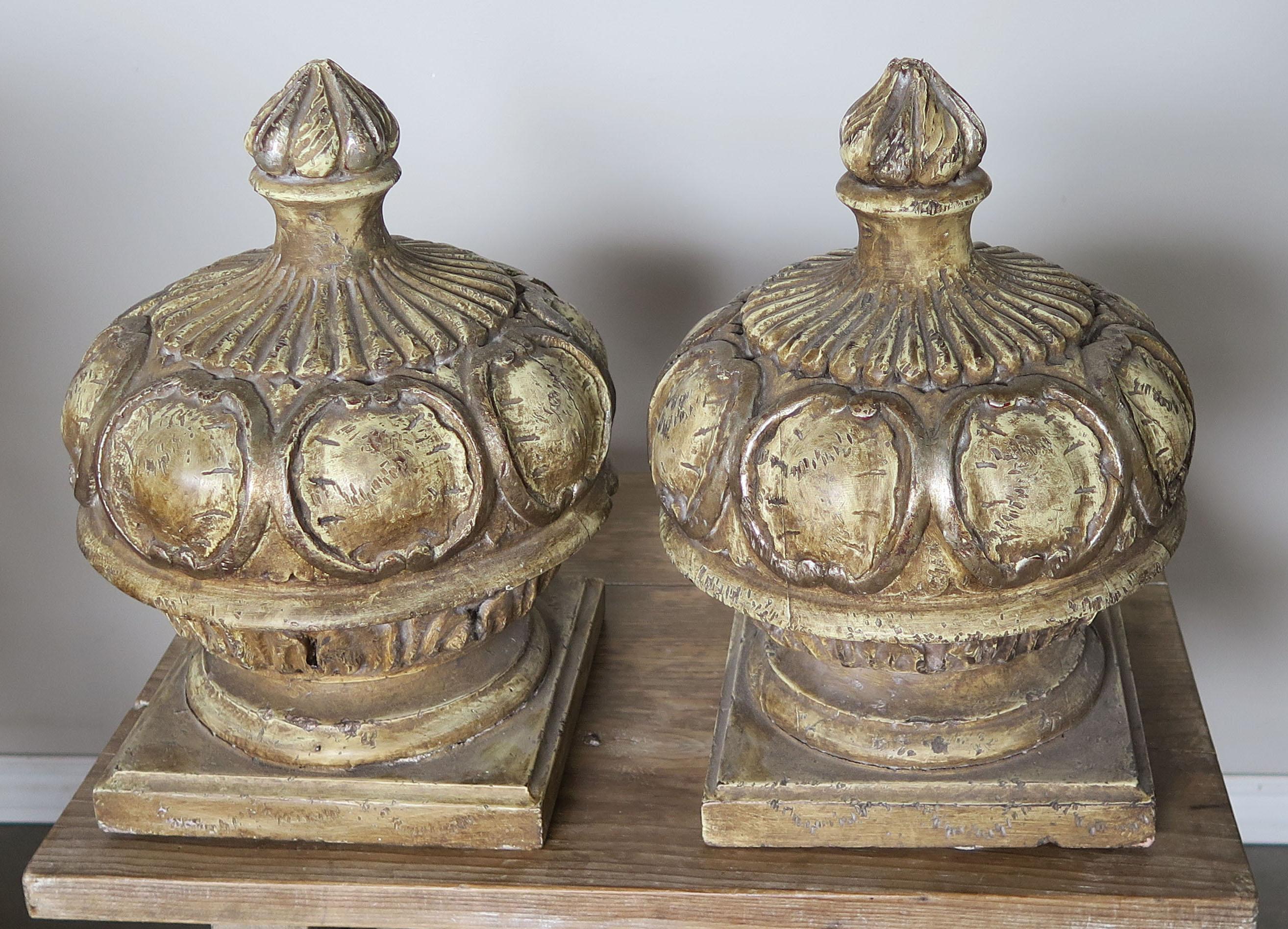 Pair of carved wood Italian painted finials with flame tops. Worn distressed paint.