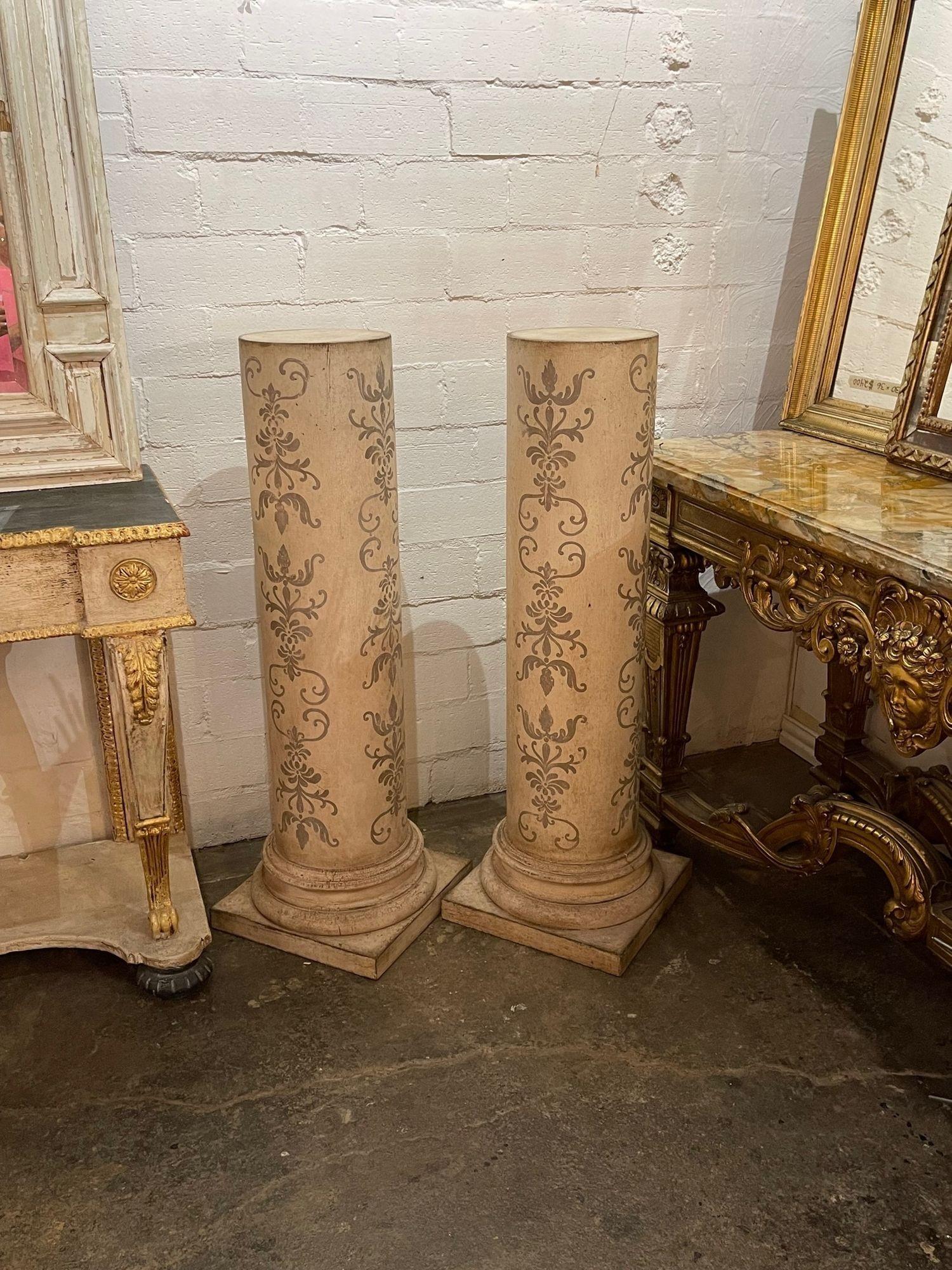 Very nice pair of vintage hand painted Italian wooden pedestals from Florence Italy. Featuring a decorative design painted in antique gold. A fabulous accessory!!