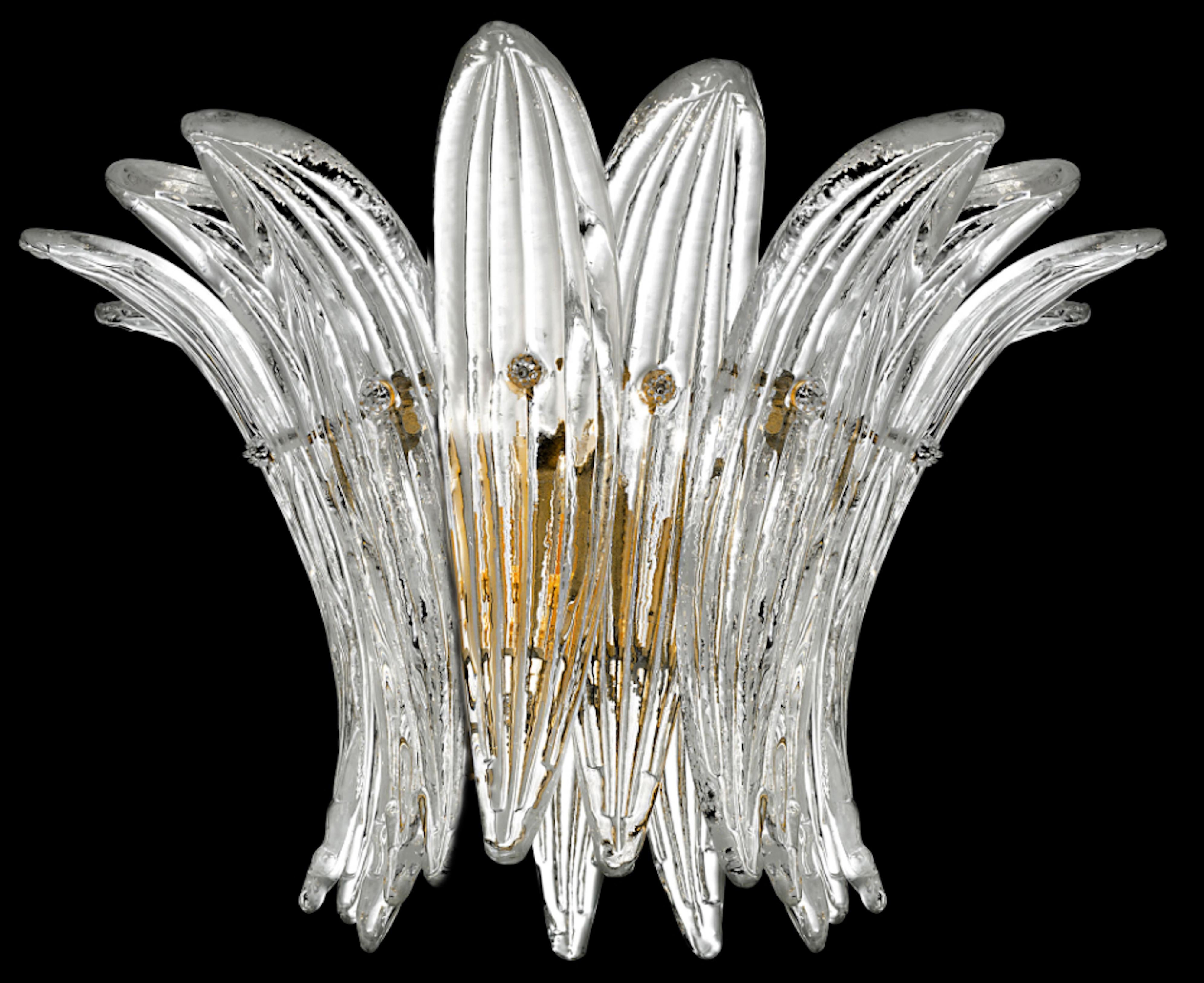 Pair of sconces in the style of Barovier & Toso.
Each sconce is composed of 9 palmettes in pure Murano glass arranged horizontally.