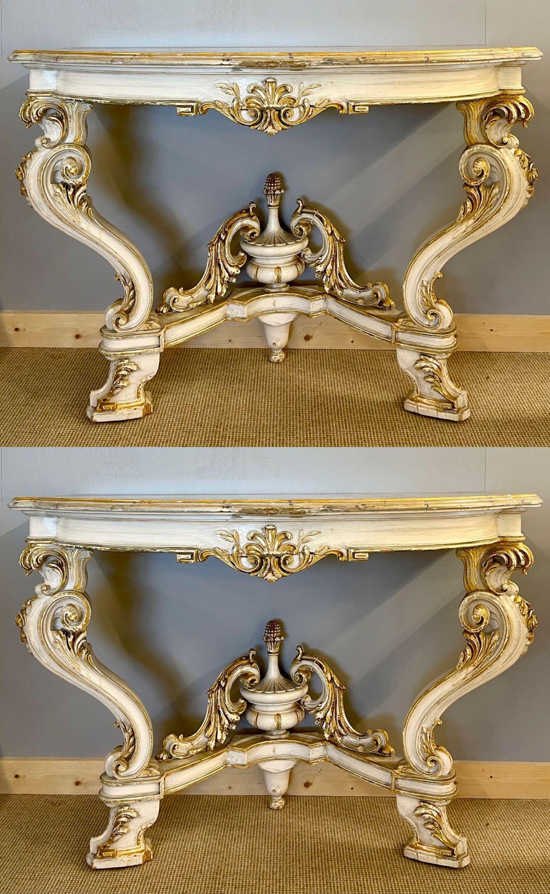 A pair of Italian parcel wonderfully paint and gilt decorated demilune faux marble-top console or sofa tables, late 19th or early 20th century these finely carved cabriole leg freestanding consoles could use a little support from being mounted