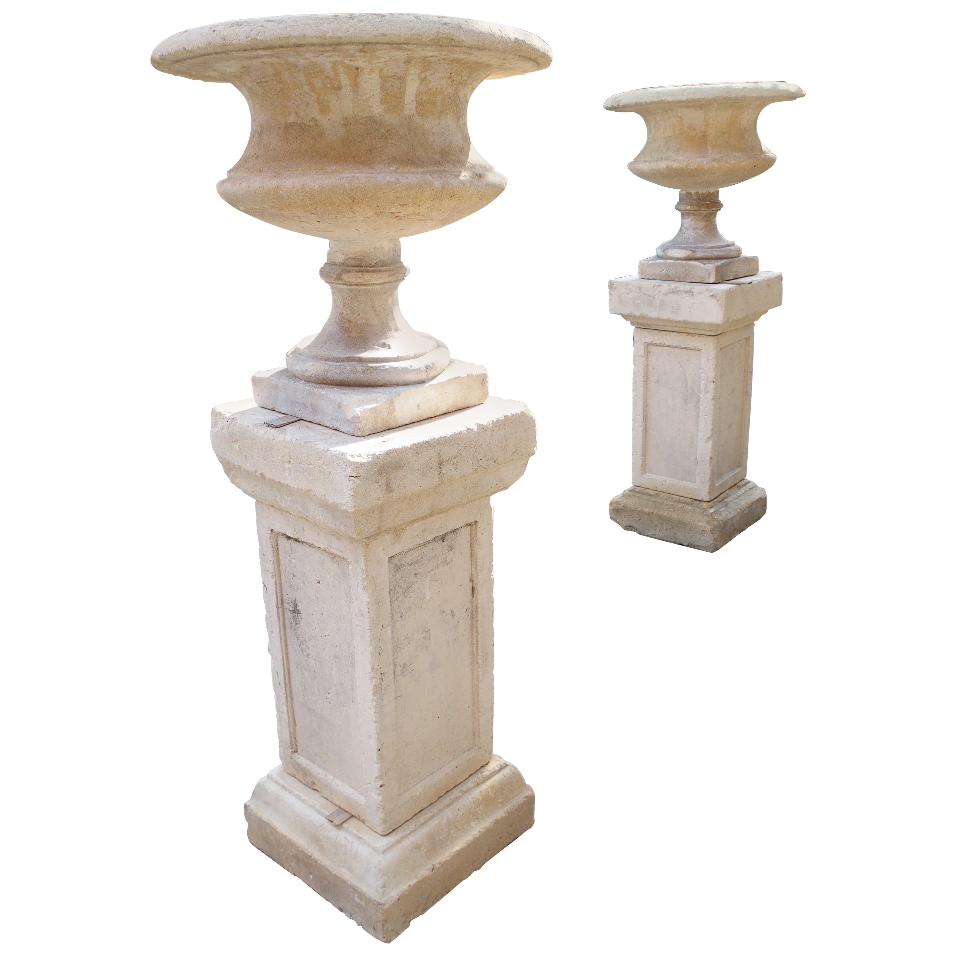 Pair of Italian Patinated and Distressed Cast Stone Vases on 3-Piece Plinths