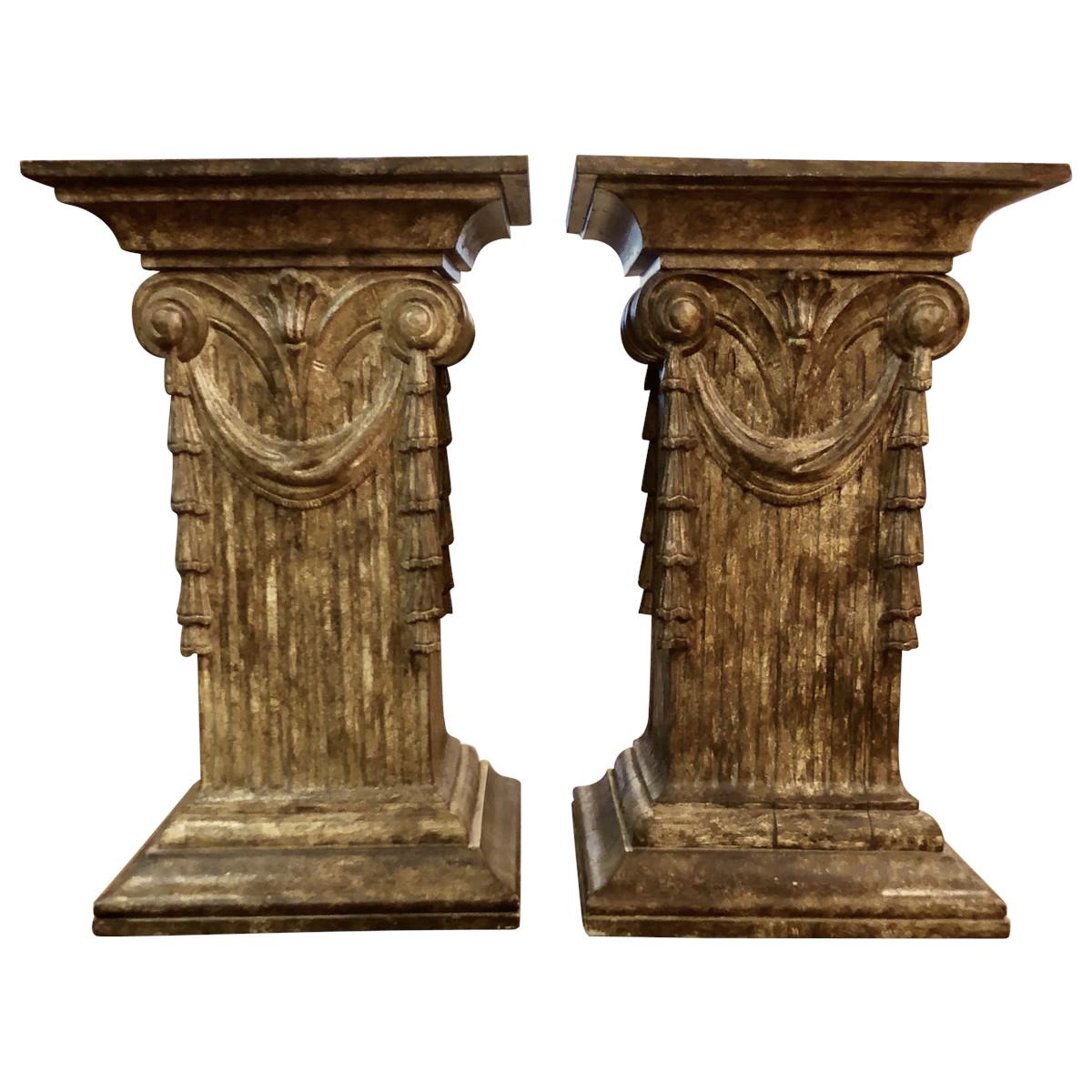 Pair of Italian pedestal dining table bases are elegant and stylish. The bases are made of hand carved and painted wood with an antiqued faux stone finish. These are great pieces for those that love neoclassical or Greco-Roman inspired