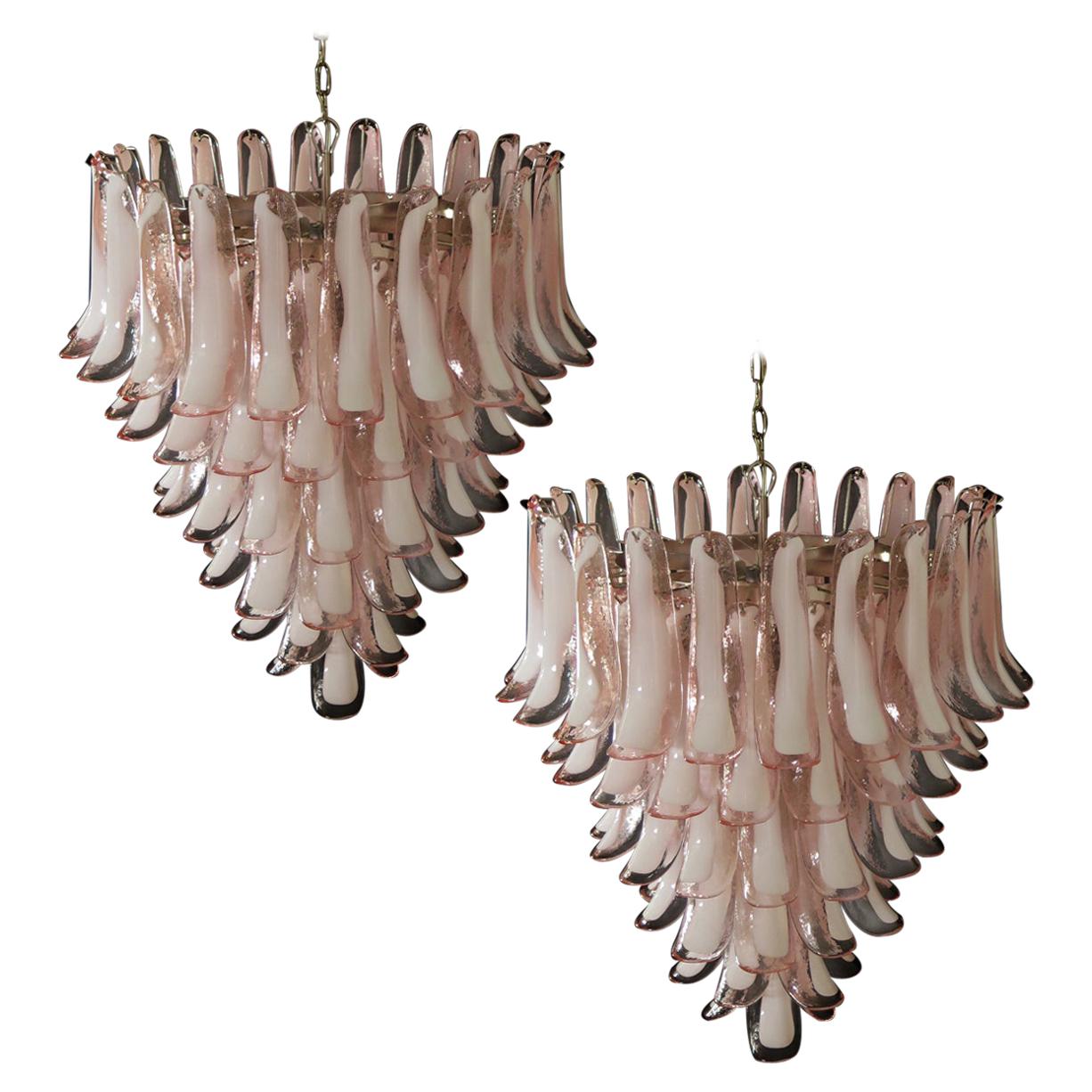 Pair of Huge Italian vintage Murano chandeliers made by 75 glass petals (pink and white “lattimo”) in a chrome frame.
Period: late 20th century
Dimensions: 65 inches (165 cm) height with chain; 37.40 inches (95 cm) height without chain; 31.50