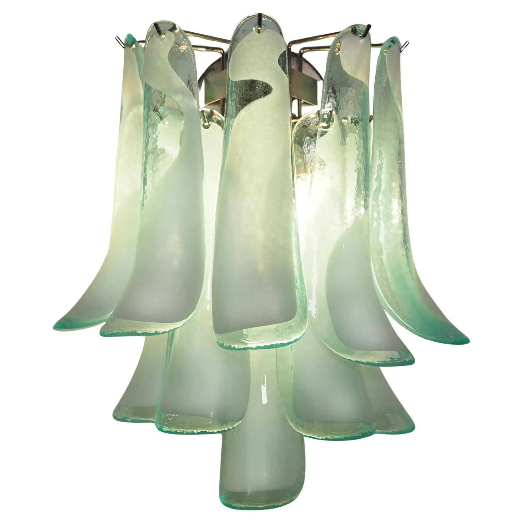 Coppia di appliques vintage di Murano alla maniera di Mazzega Murano. Le applique hanno 10 vetri 