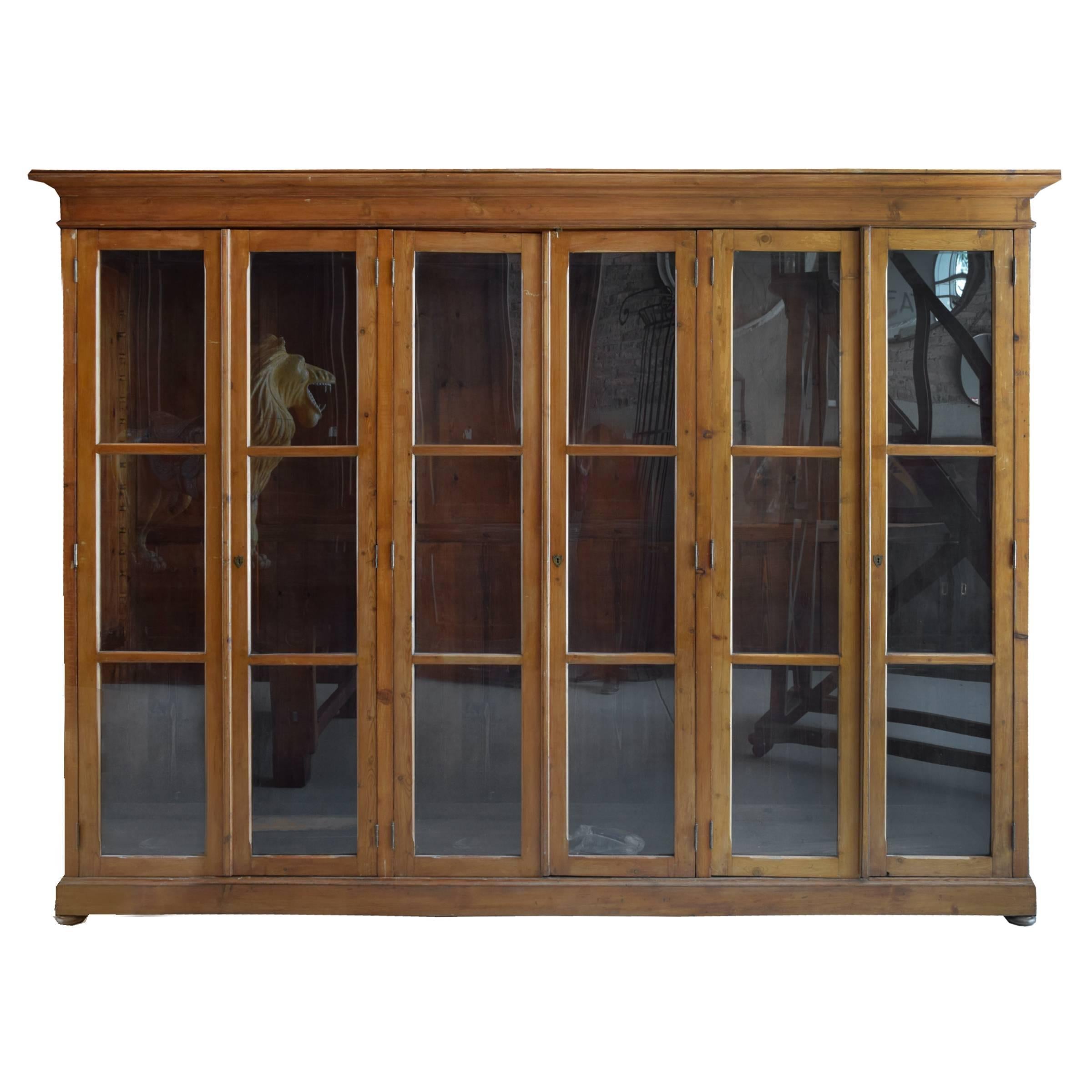 The best pair of Italian pine library cabinets with six doors, from a palazzo in Milan, circa 1910.