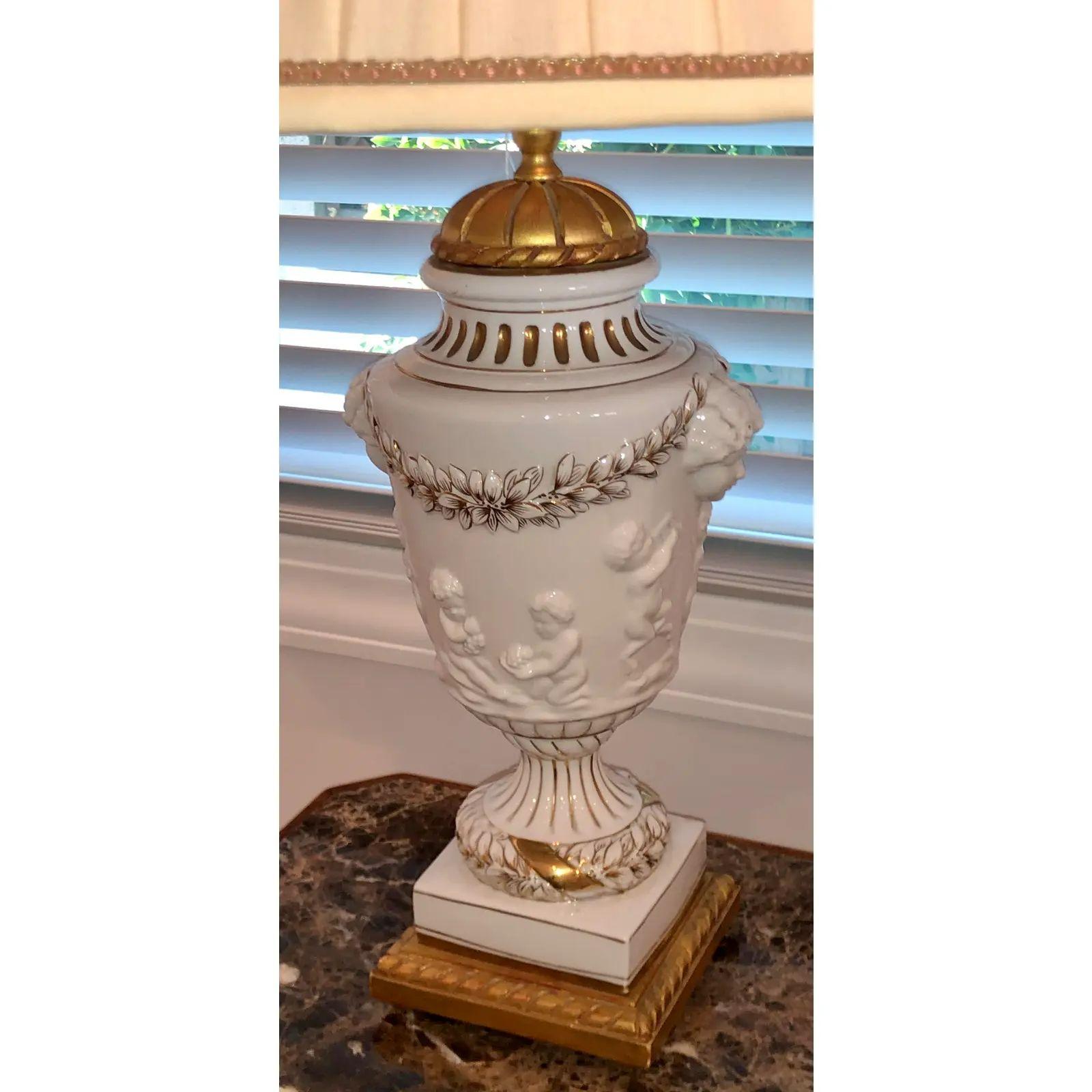 Pair of Italian Porcelain Urn Form Designer Cherub Lamps In Good Condition For Sale In LOS ANGELES, CA