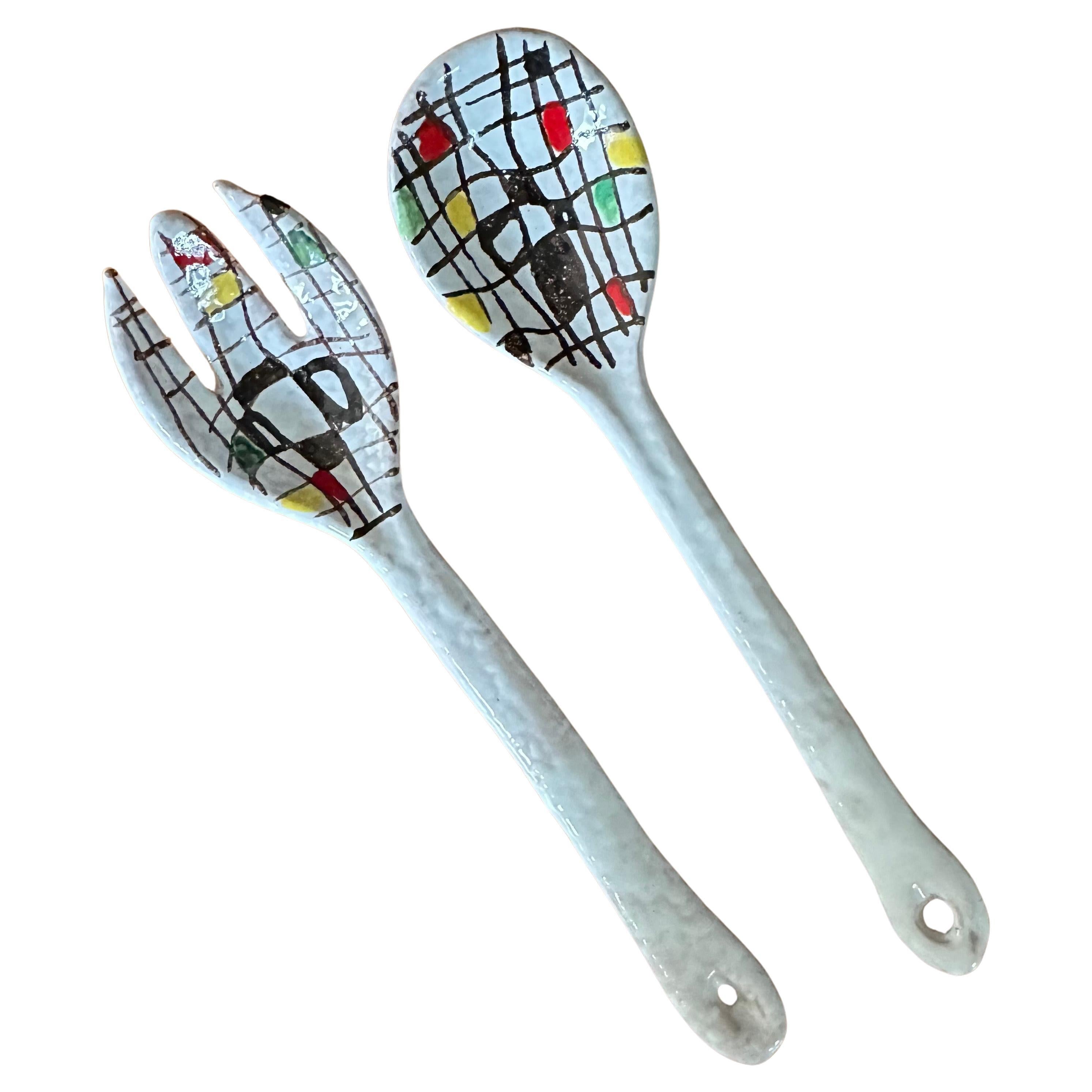 A nice pair of Italian post-modern ceramic salad servers, circa 1980s.  The set is in very good vintage condition and measures 2.75