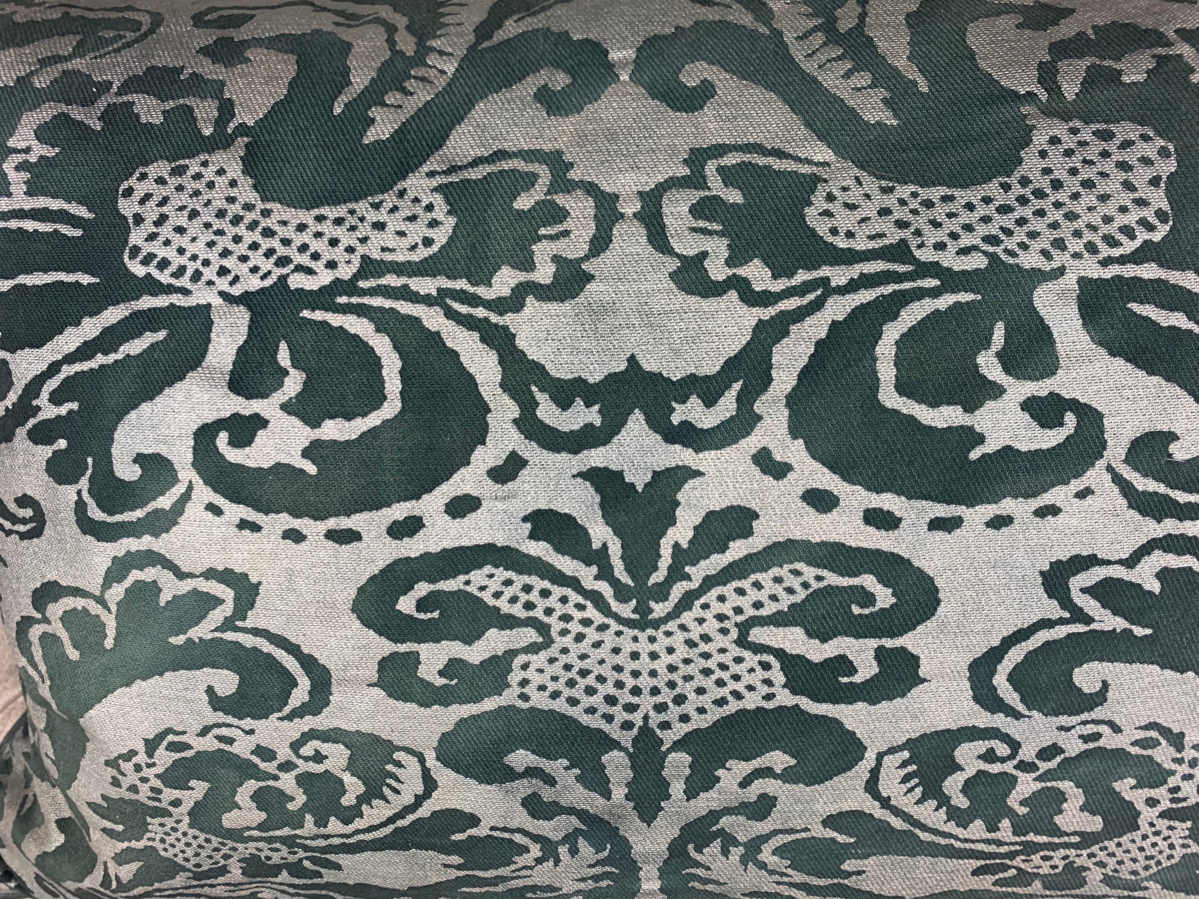 Pair of custom Italian printed cotton Fortuny pillows with gray velvet backs. This unique color is a dark greenish-almost black with a silvery gray background. Self cord detail, down inserts.