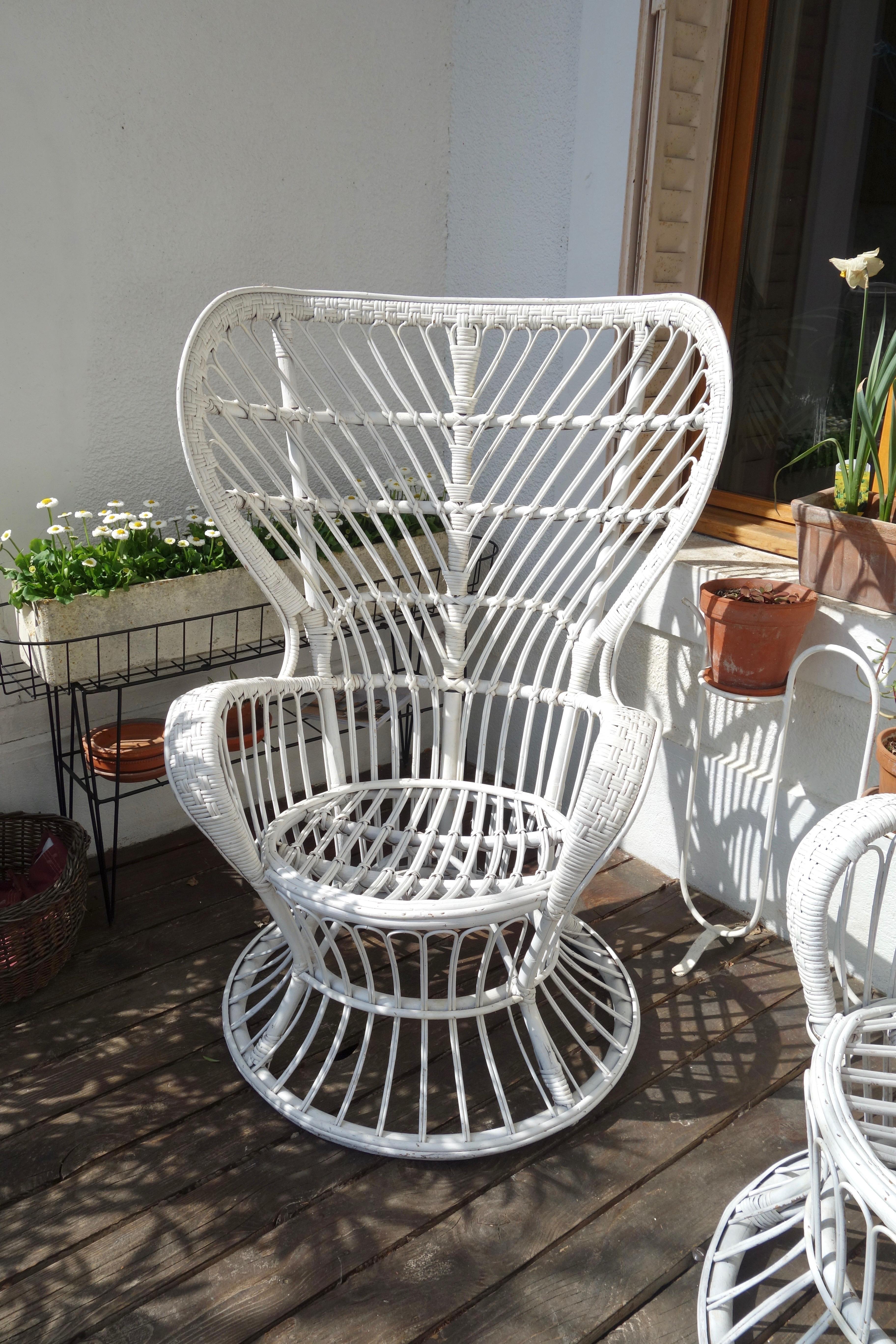 Pair of rattan armchairs by Lio Carminati for Bonacina. Italian handmade manufacture of the 1950s. Model created for the ship Conte Biancamaro. In its original state. In good condition: beautiful patina, white painted at one time, comfortable