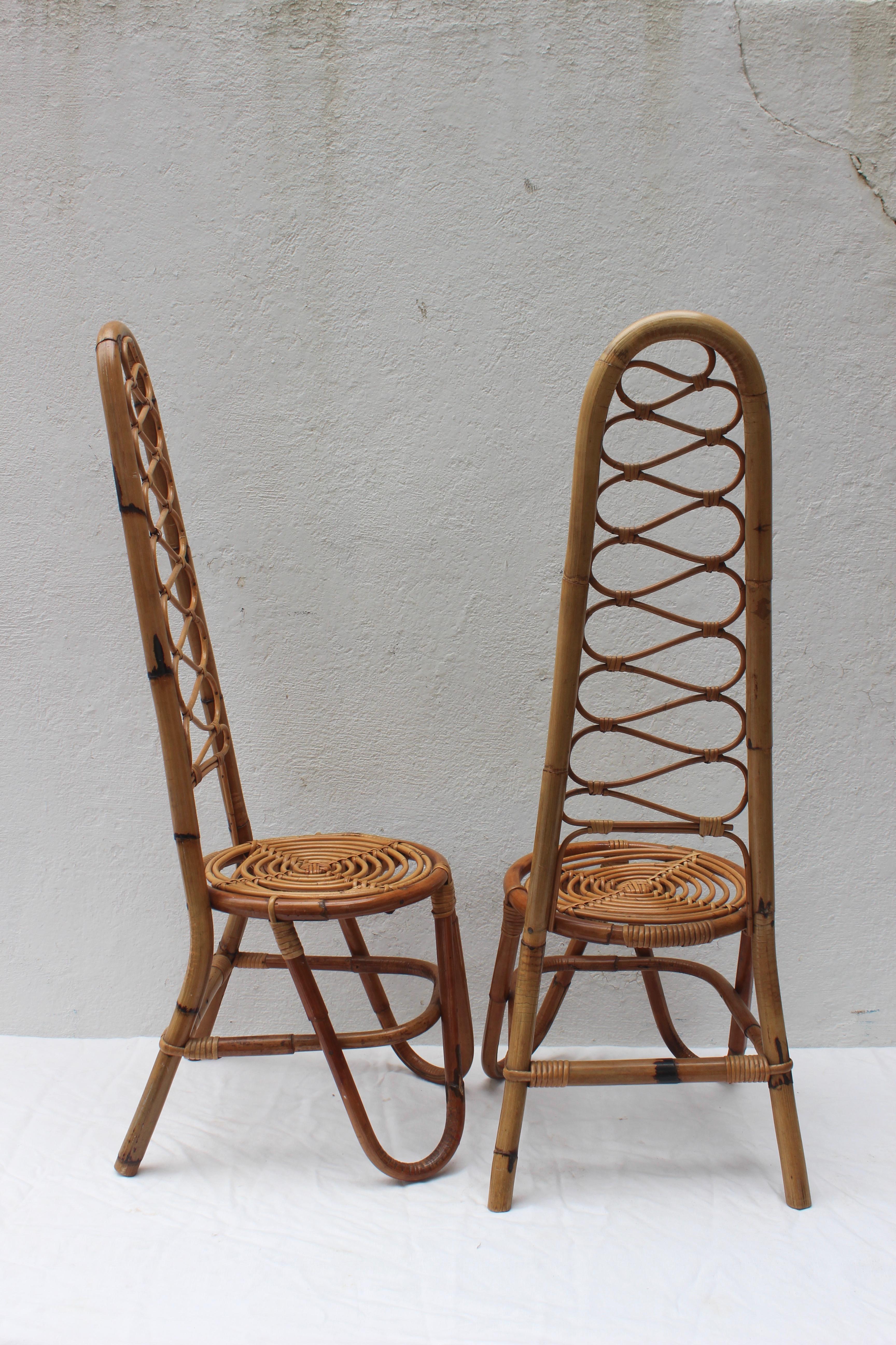 Pair of Italian rattan chairs, having round seat and S form back.
