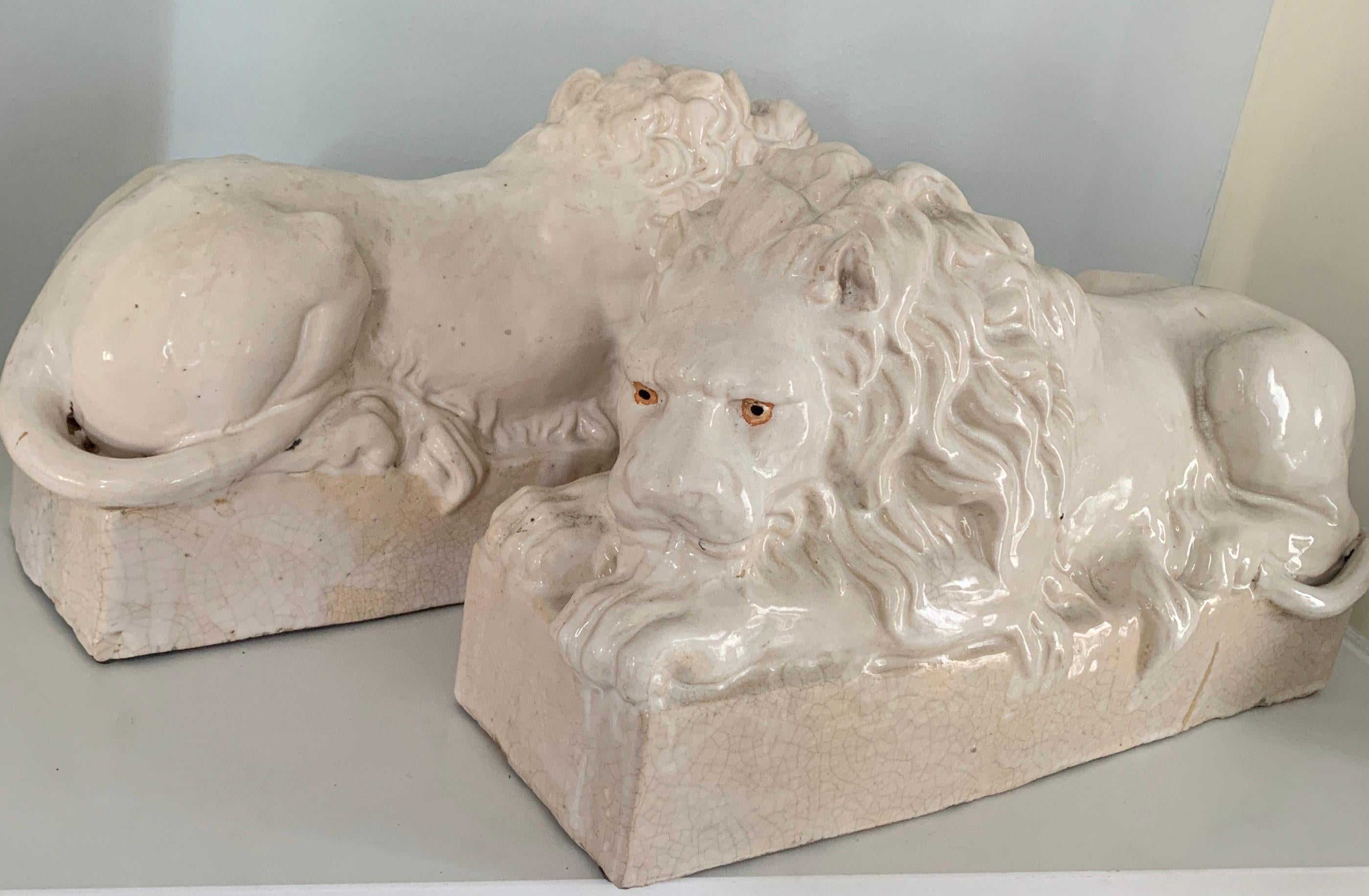 Mid-Century Modern Pair of Italian Reclining Glazed Terracotta Lions For Sale