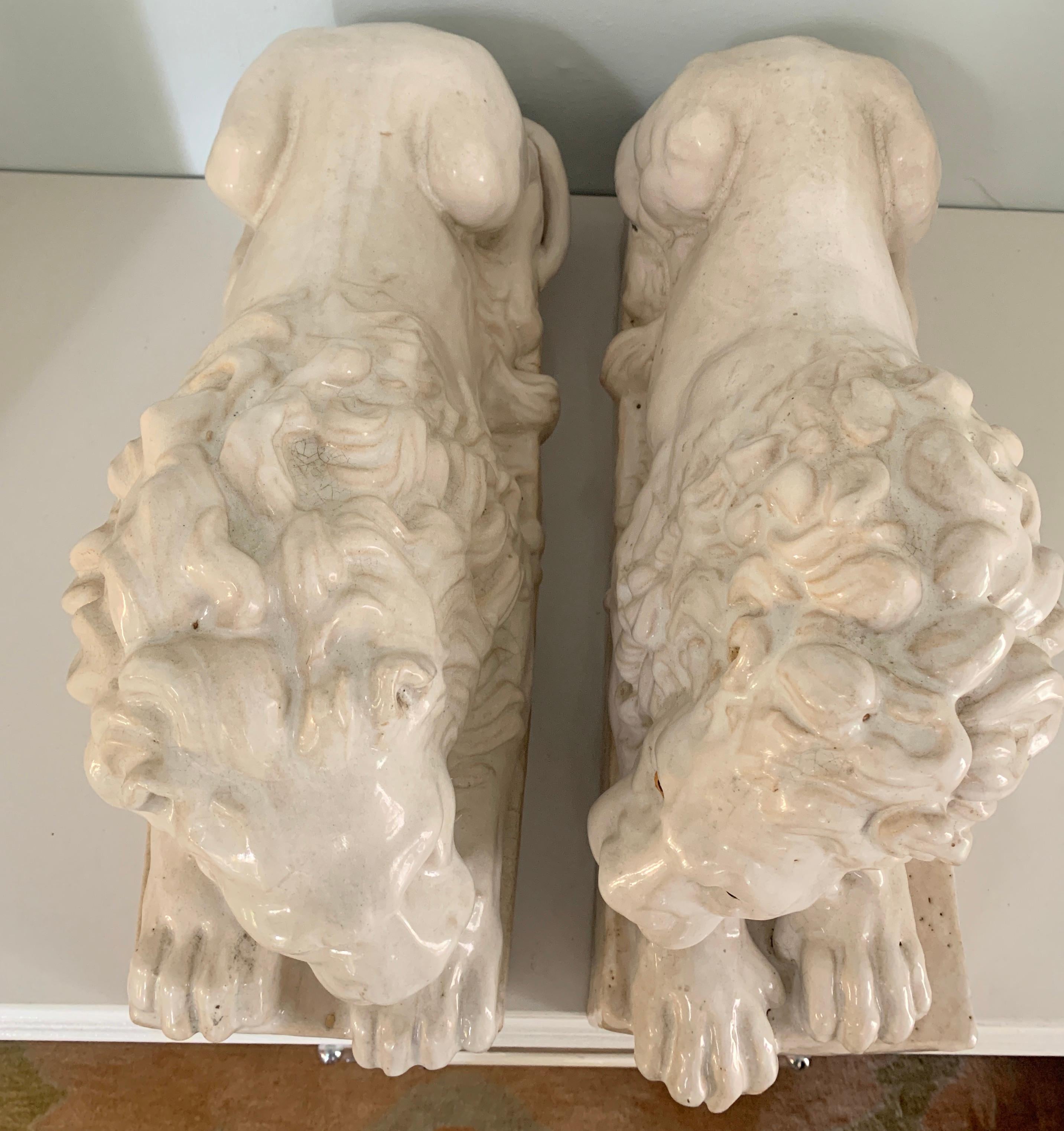 Pair of Italian Reclining Glazed Terracotta Lions For Sale 1