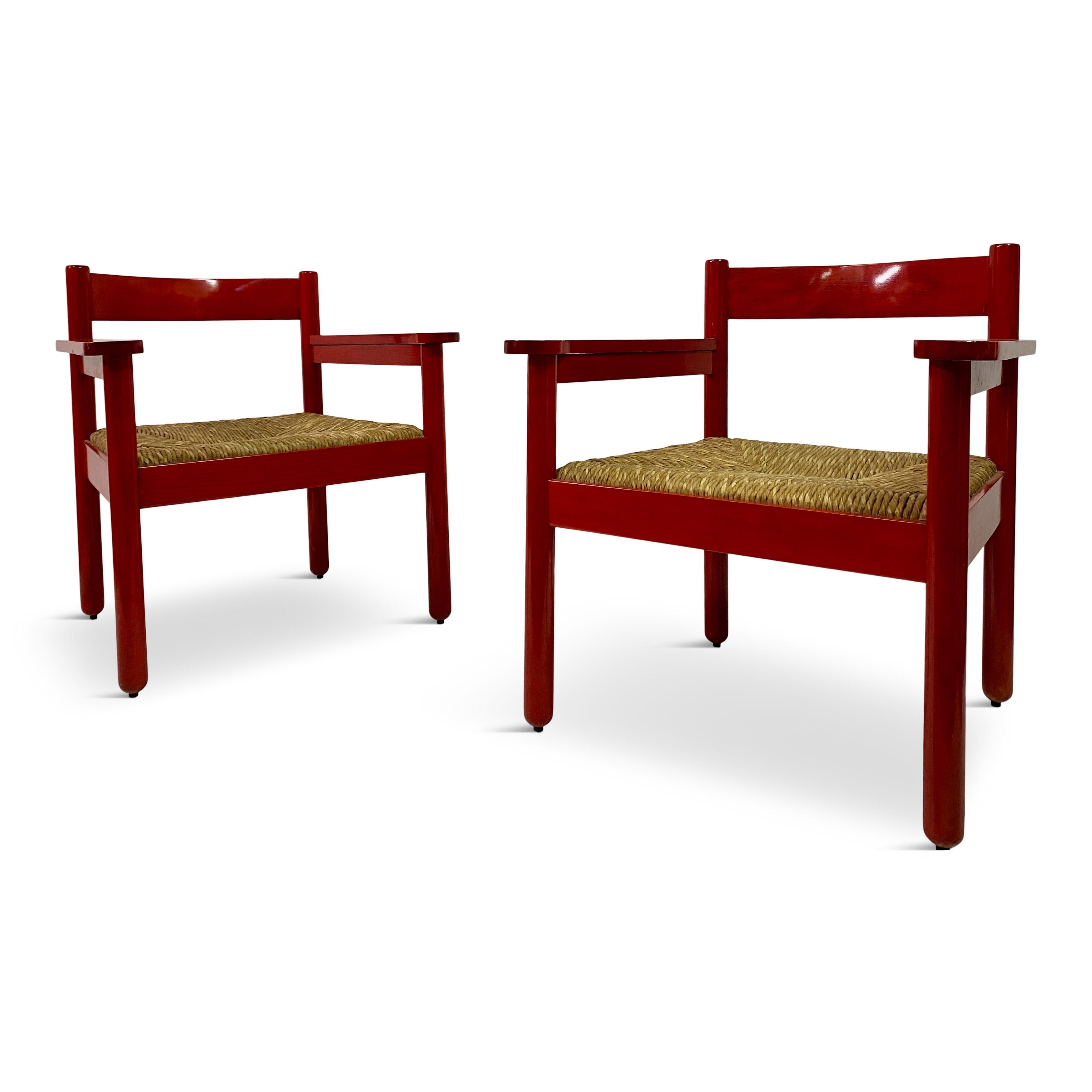 Pair of armchairs

Red beech frame

Rush seats

Similar in style to designs by Vico Magistretti

Seat height 40cm

Italy 1960s.