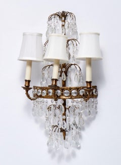 Pair of Italian Regency Style Crystal and Gilt Metal Three-Light Wall Sconces