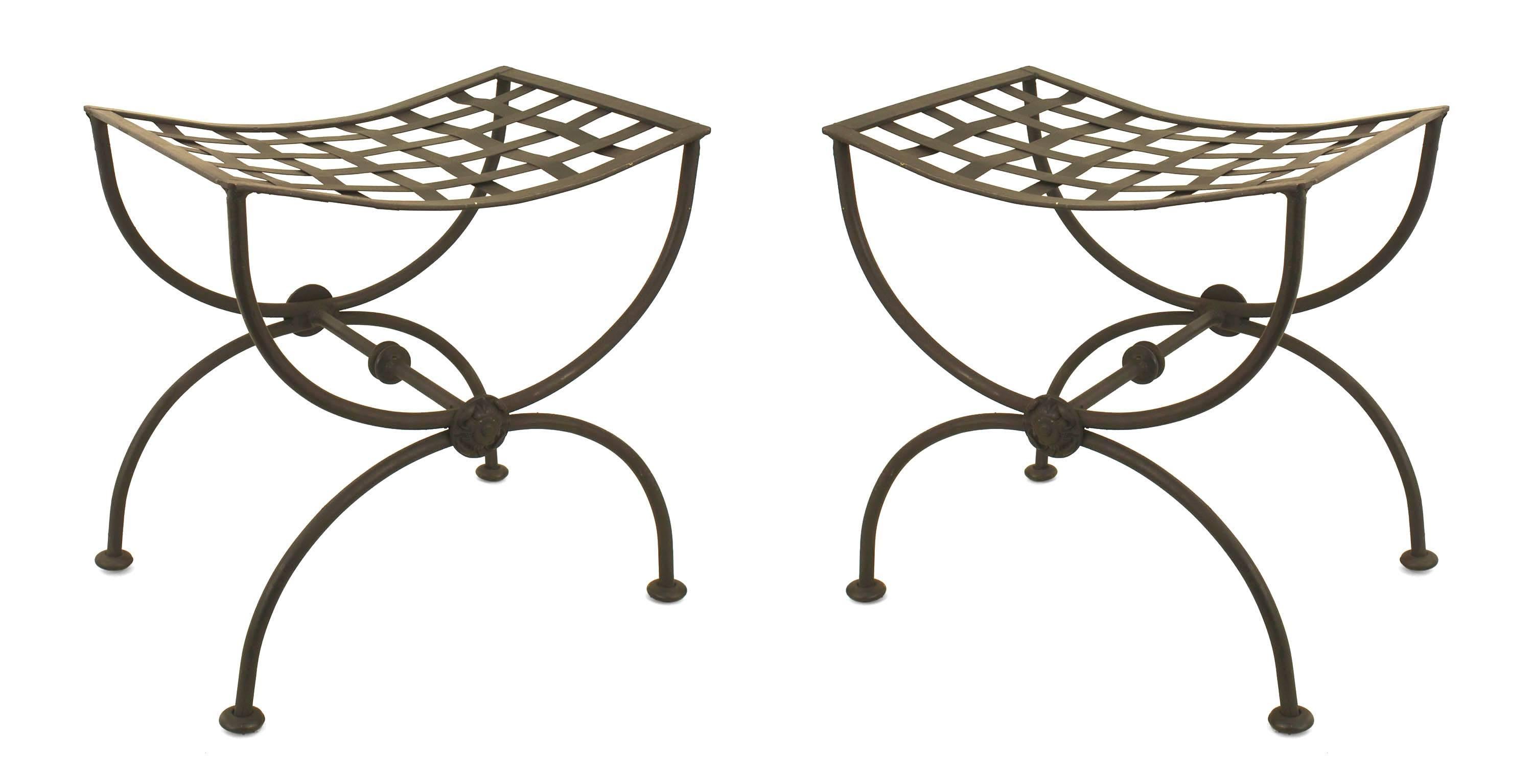 Pair of Italian Renaissance style (1940s) black painted wrought iron benches with cross form 