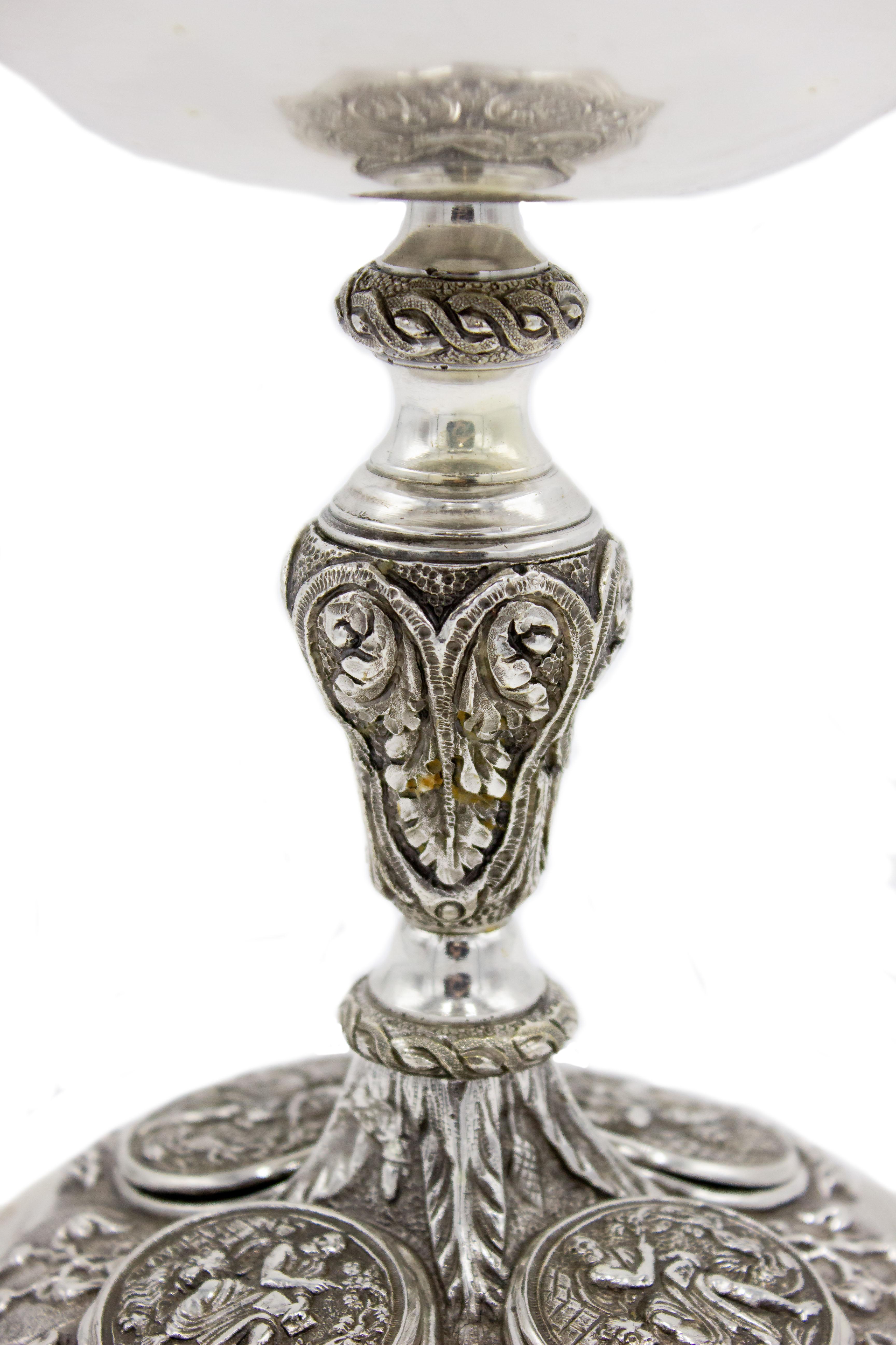 Pairof Italian Renaissance-style (19th century) silver plate ceremonial chalice cups with 4 medallions on shaped base (priced as pair).
 