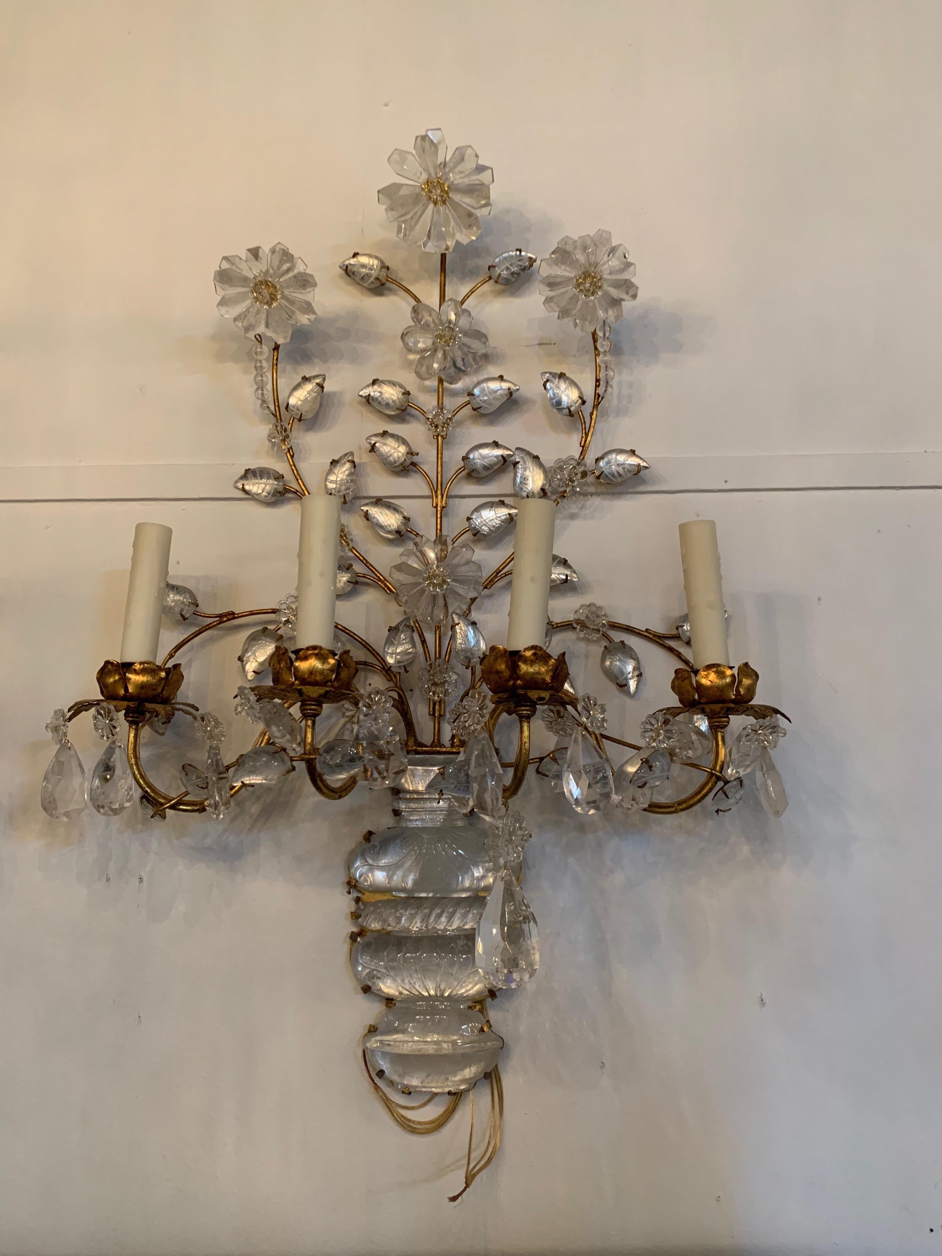 Fine pair of Italian rock crystal and gilt metal sconces. There are 4 lights on each sconce. Makes a beautiful statement!
 