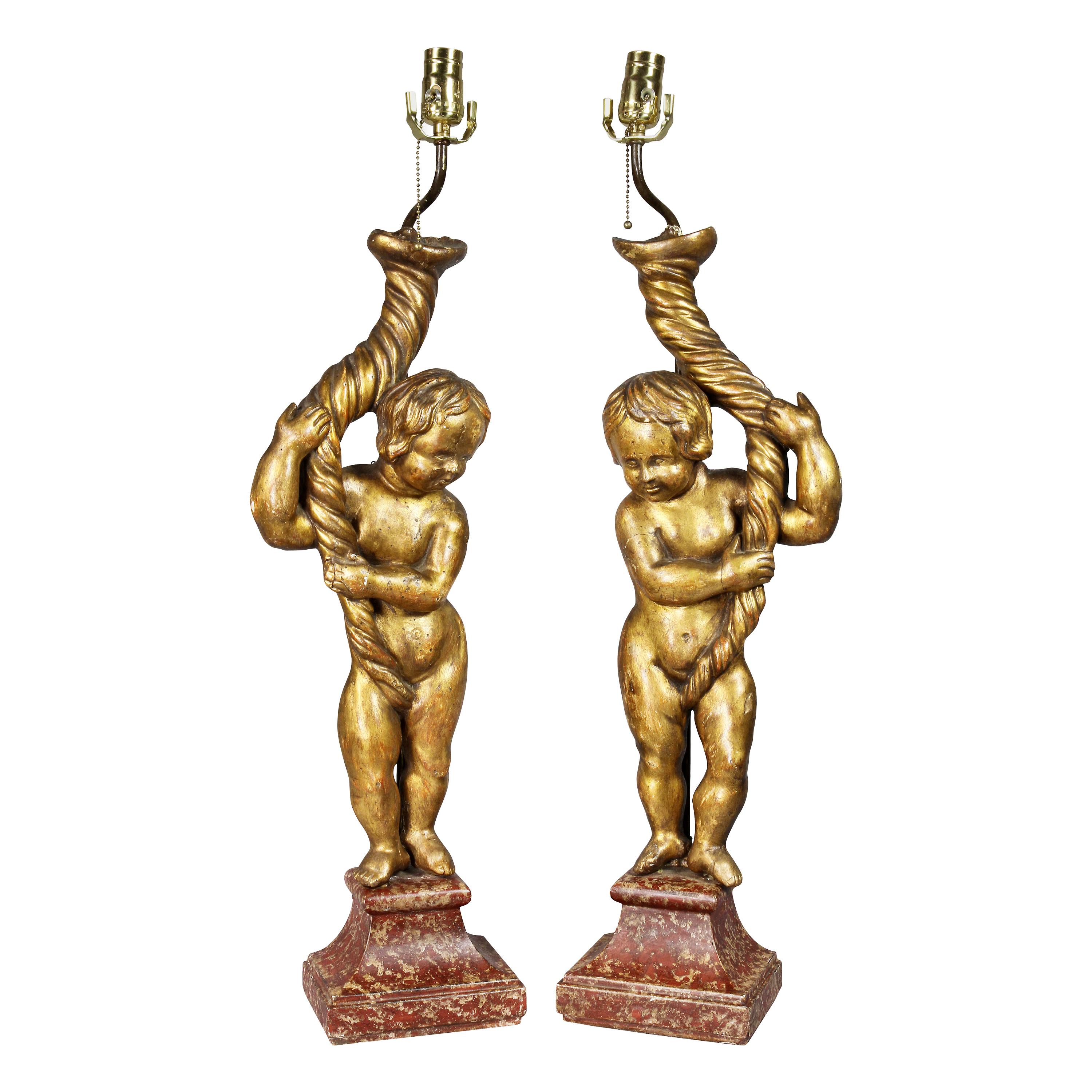 Pair of Italian Rococo Giltwood Figural Lamps For Sale