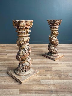 Pair of Italian Rococo Painted and Parcel Gilt Columns
