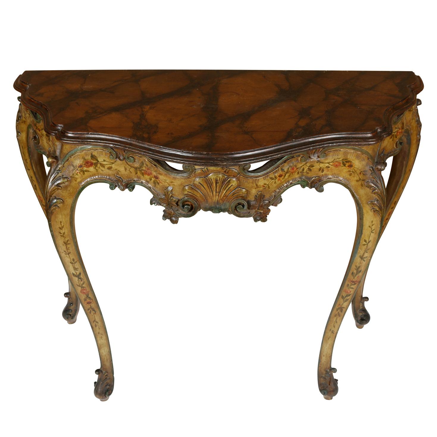 A pair of Italian rococo shaped and carved demi-lune console table with faux marble top, cabriole legs and floral painted details to apron