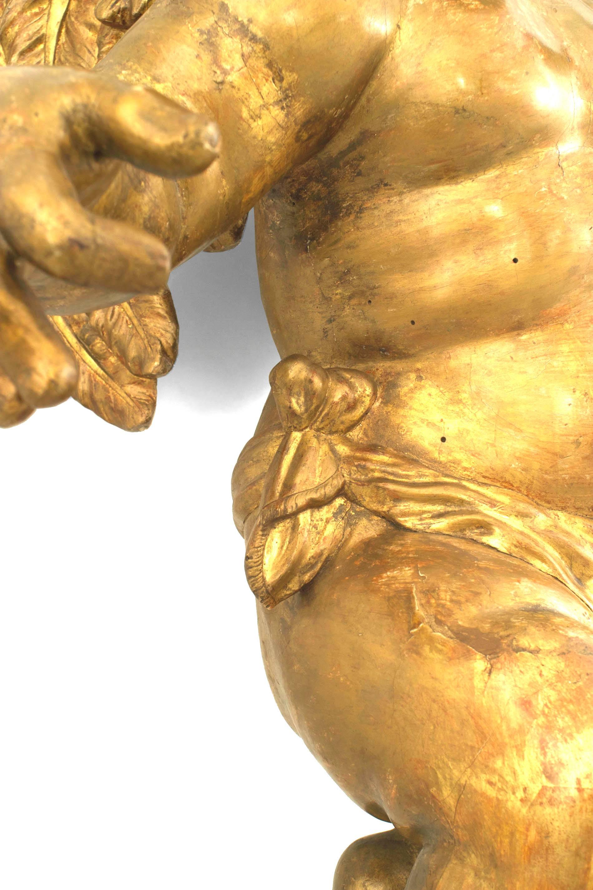 Pareja de Cupidos colgantes de tamaño natural de estilo rococó italiano en Bueno estado para la venta en Queens, NY