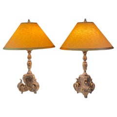 Coppia di lampade in legno intagliato in stile rococò italiano