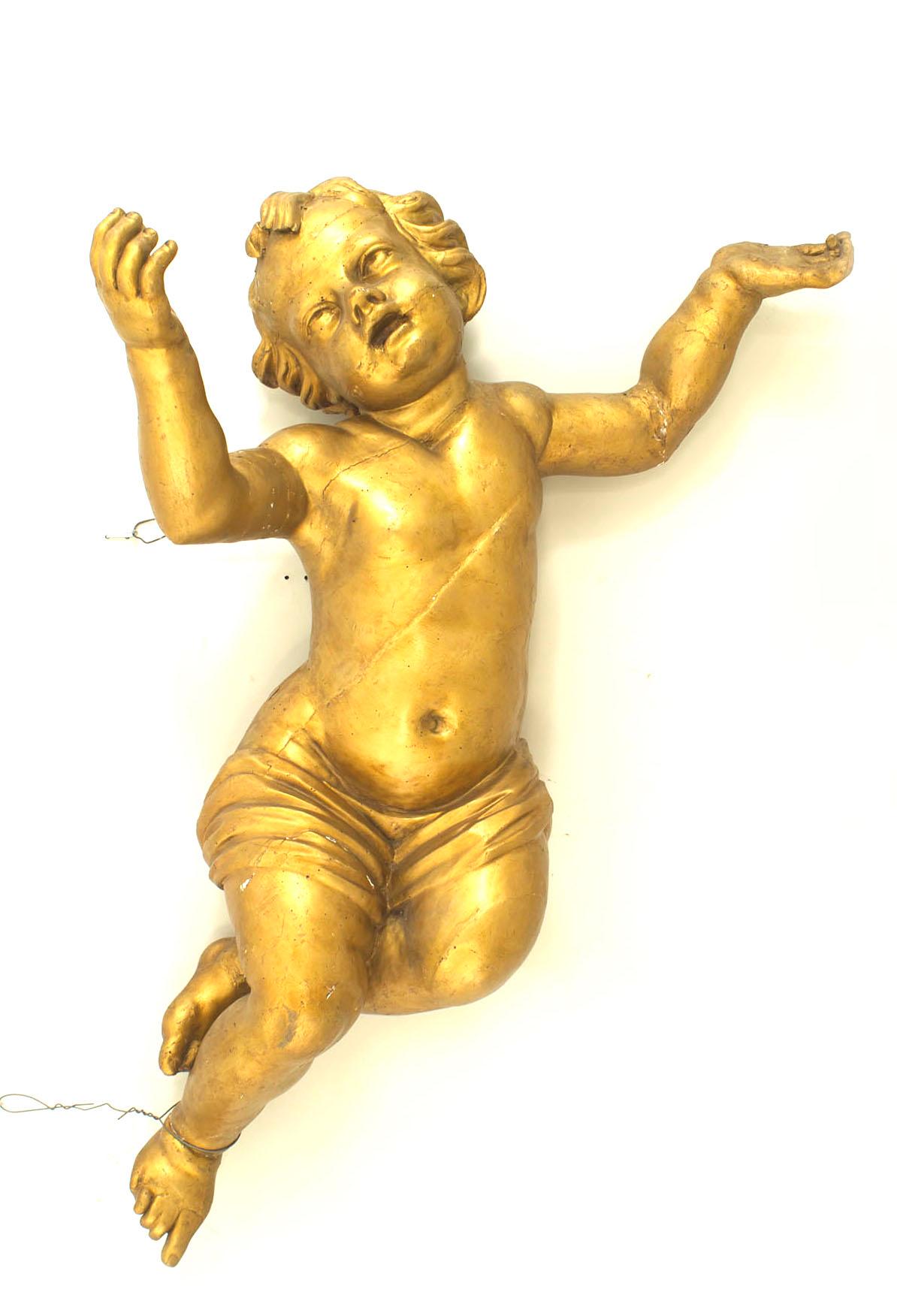 Pair of Italian Rococo style gold painted large hanging cupid figures.(18/19th Cent)
