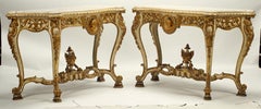 Pair of Italian Rococo Style Painted and Parcel Gilt Consoles, Mid 19th c.
