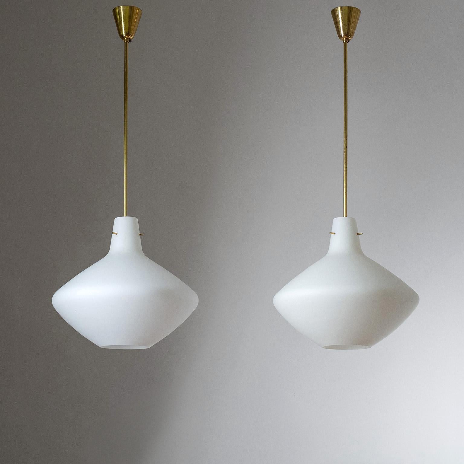 Pair of Italian satin glass pendants from the 1950s. Large blown 'triplex opal' glass diffusers with a satin finish and all brass hardware. One brass and ceramic E27 socket each with new wiring. Glass body height is 30cm/13