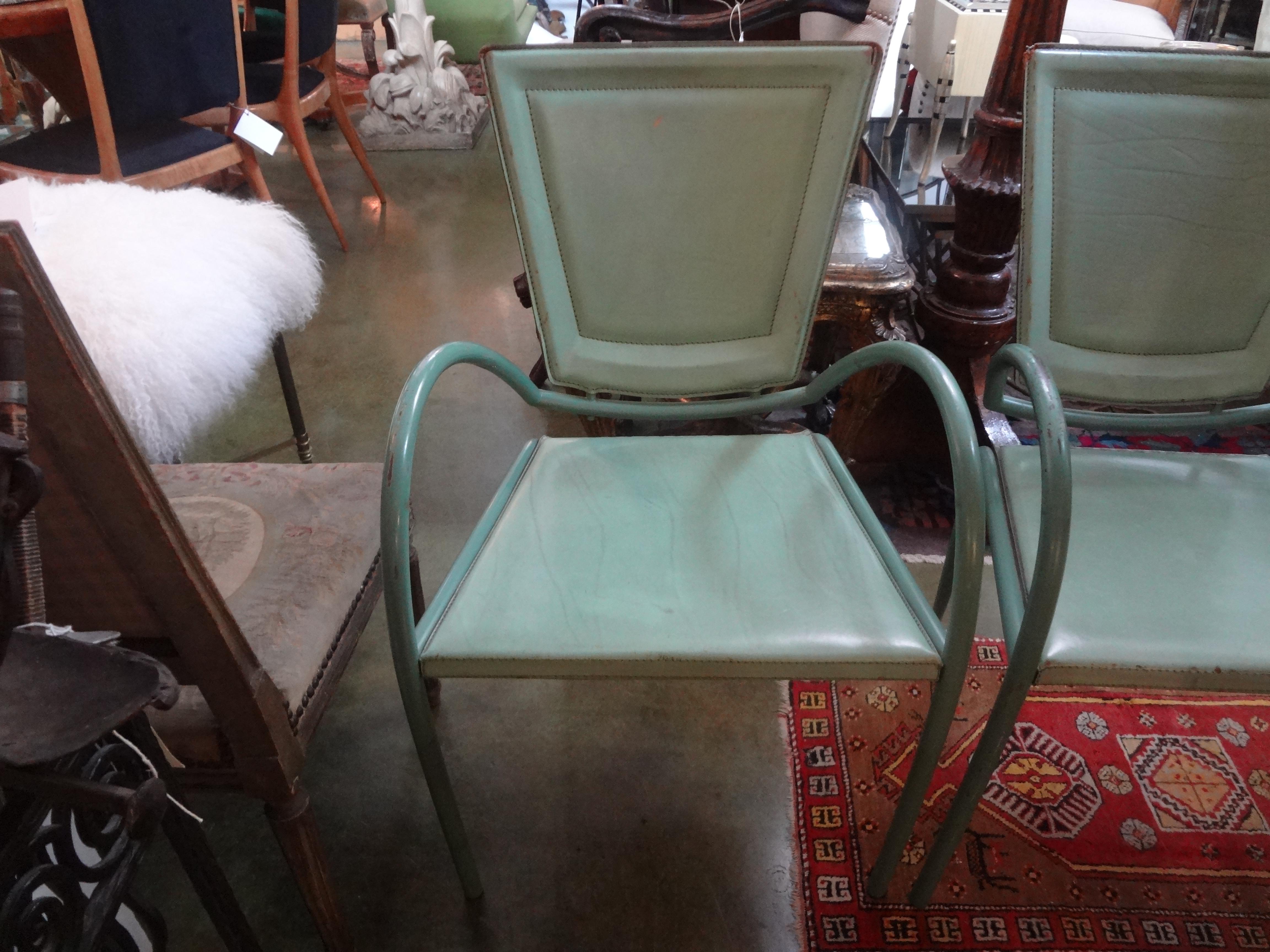 Pair of Italian Sawaya and Moroni iron and leather chairs.
Stunning pair of Italian iron and leather chairs by Sawaya & Moroni, made in Milan. These Italian side chairs are in a fabulous green iron and green stitched leather and retain their