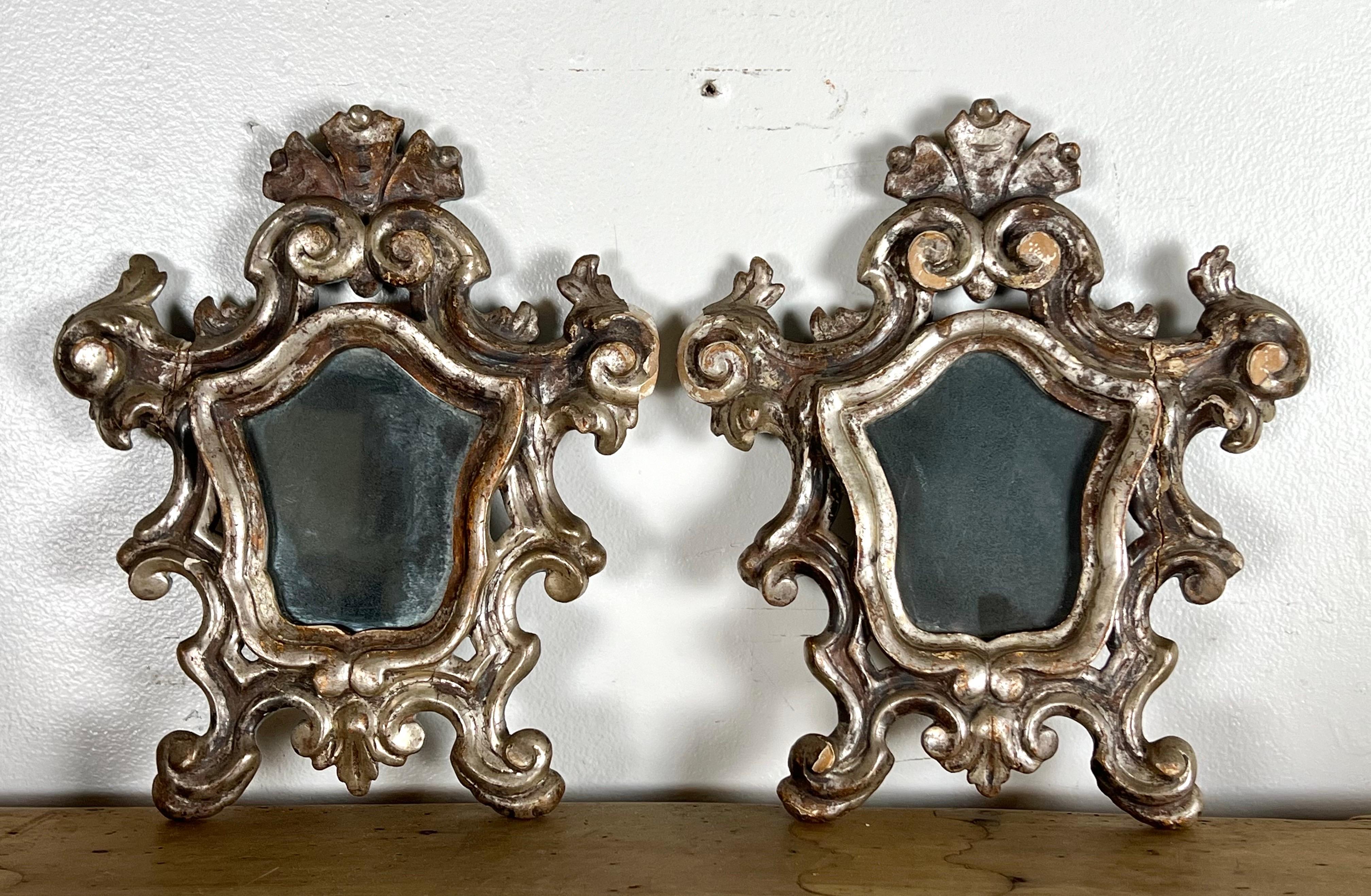 Hand-Carved Pair of Italian Scrolled Silver Leaf Baroque Style Mirrors For Sale