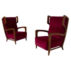 Pair of Italian sculptural armchairs by Orlando Orlandi in burgundy velvet