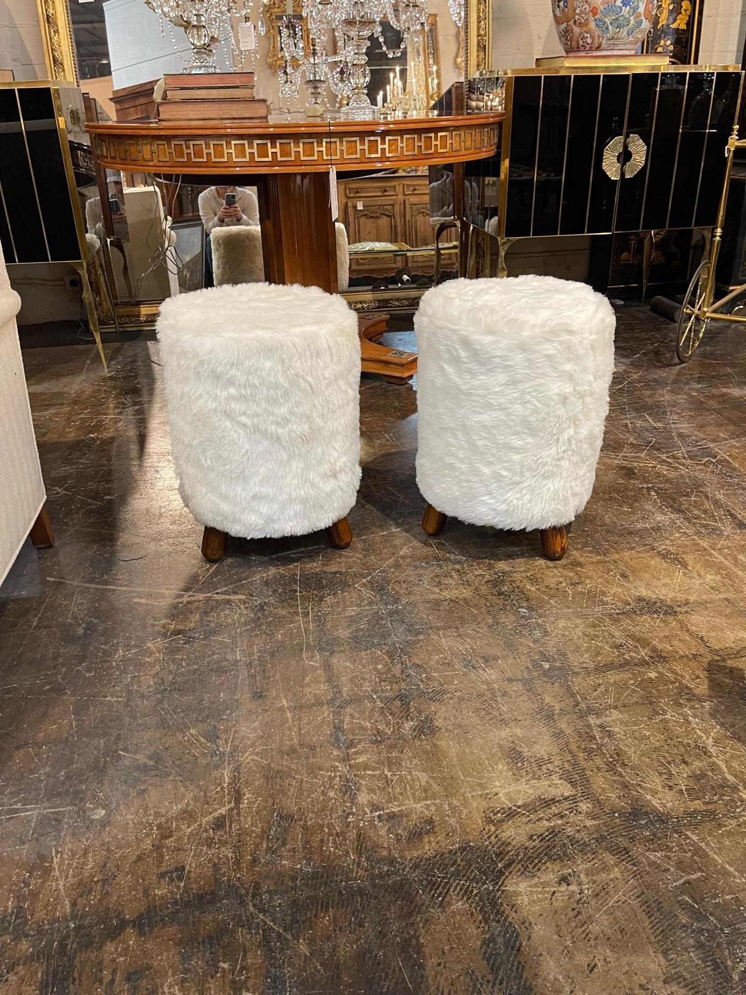 Pair of modern Italian Sherpa stools, Circa 2000. A fine addition to any home.