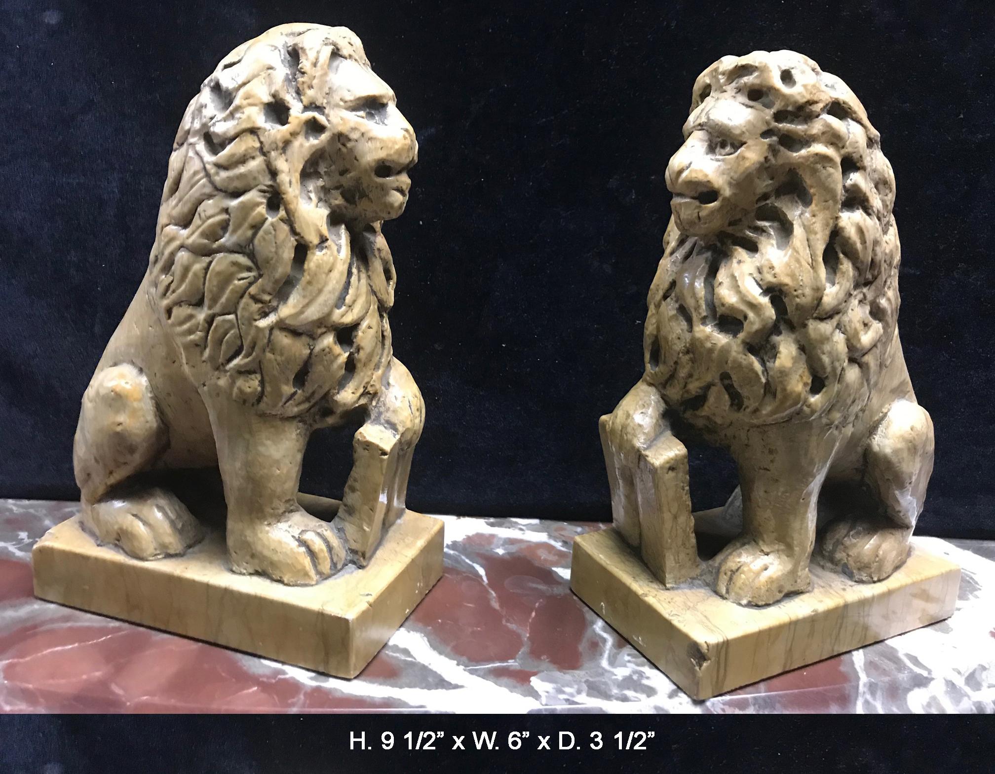 Pretty 19th century pair of Italian finely hand carved sienna marble small opposing lions
The lions would make a great decoration for a desk, table, or even mantel (fireplace).
Measures: H 9 1/2