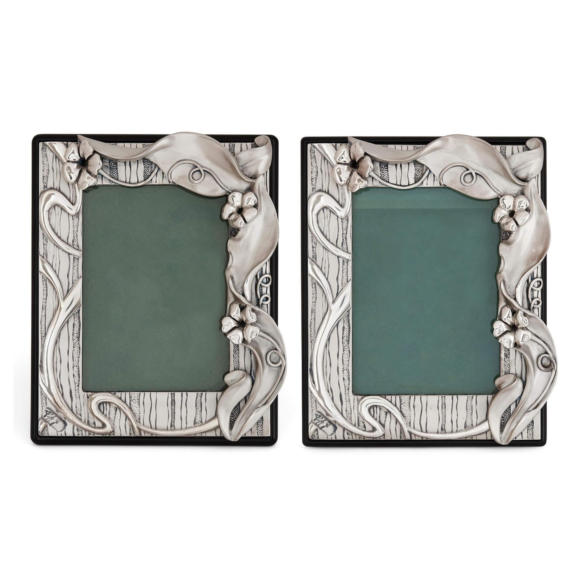 Pair of Italian silver picture frames in the Art Nouveau style.
Italian, 20th Century
Measures: height 24cm, width 20cm, depth 4cm, depth when open 16cm.

The elegant frames in this pair are crafted in the Art Nouveau style. Each frame features
