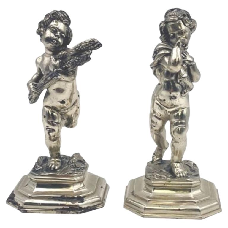 Pair of Italian Solid Silver Two of the Four Seasons Cherub Sculptures For Sale