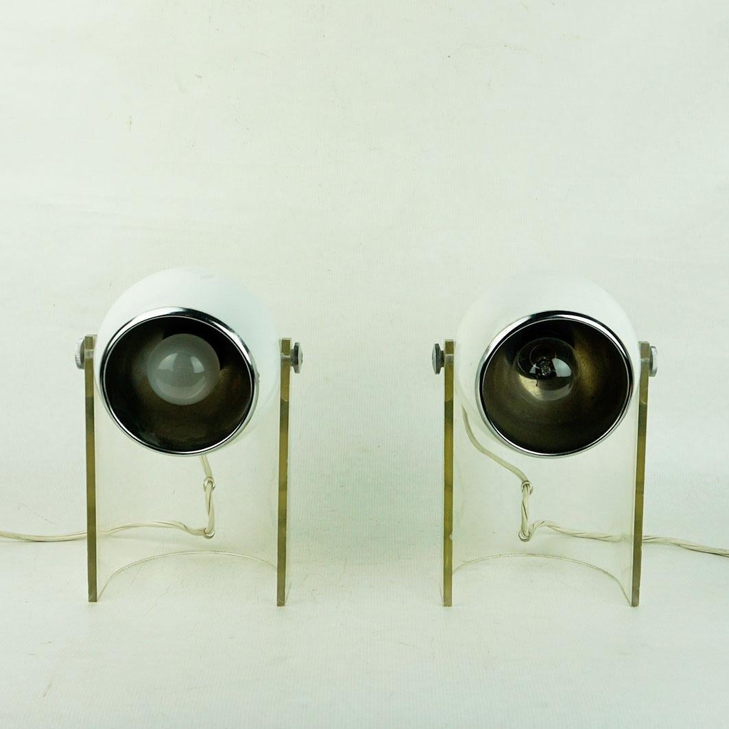 This amazing Space Age Eyeball tablelamps have been designed and manufactured in Italy 1960s. They feature a lucite base with lacquered adjustable eveball spots.
Their style is inspired by lamps designed by Gino Sarfatti or Robert Sonneman
So this