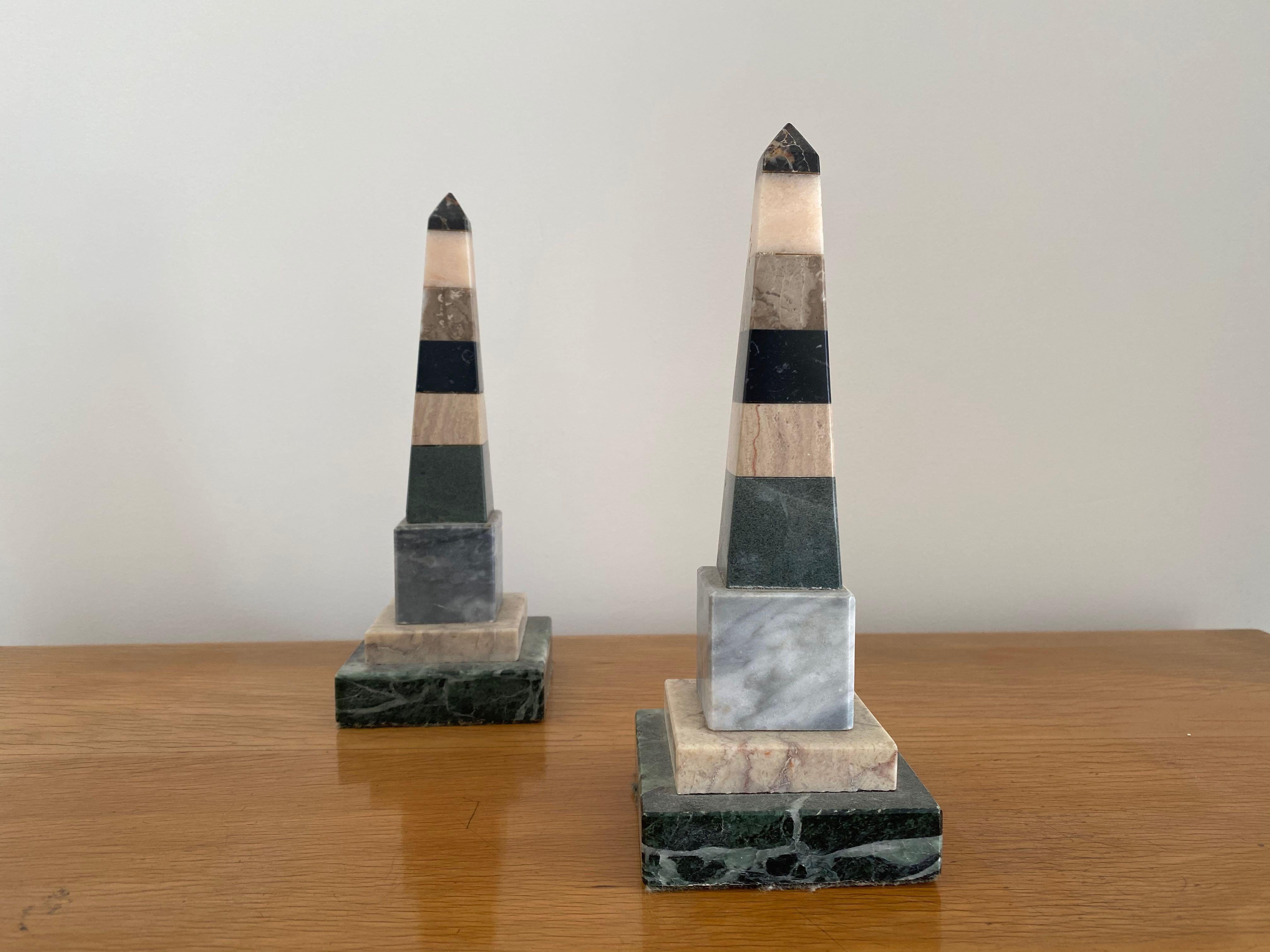 Pair of obelisks

Nine specimen marble pieces

Subtle pastel colors,

Italian,

Early 20th-late 19th century.