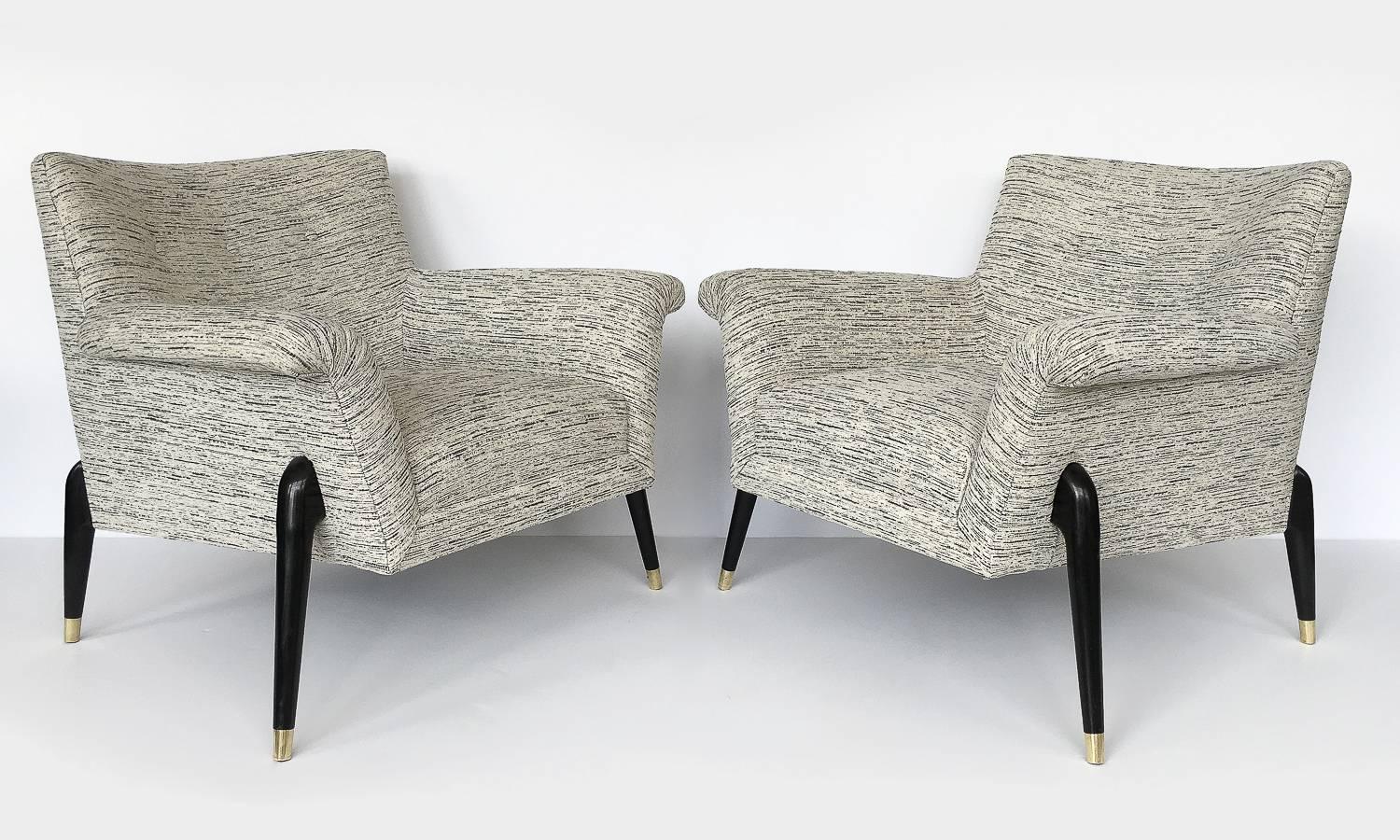 Pair of unusual Italian spider leg lounge chairs in the style of Ico Parisi or Jean Royère. Striking from all angles! Sculptural ebonized arching legs protrude from the sides of the chairs and smaller back legs are placed at 45 degrees to the chair