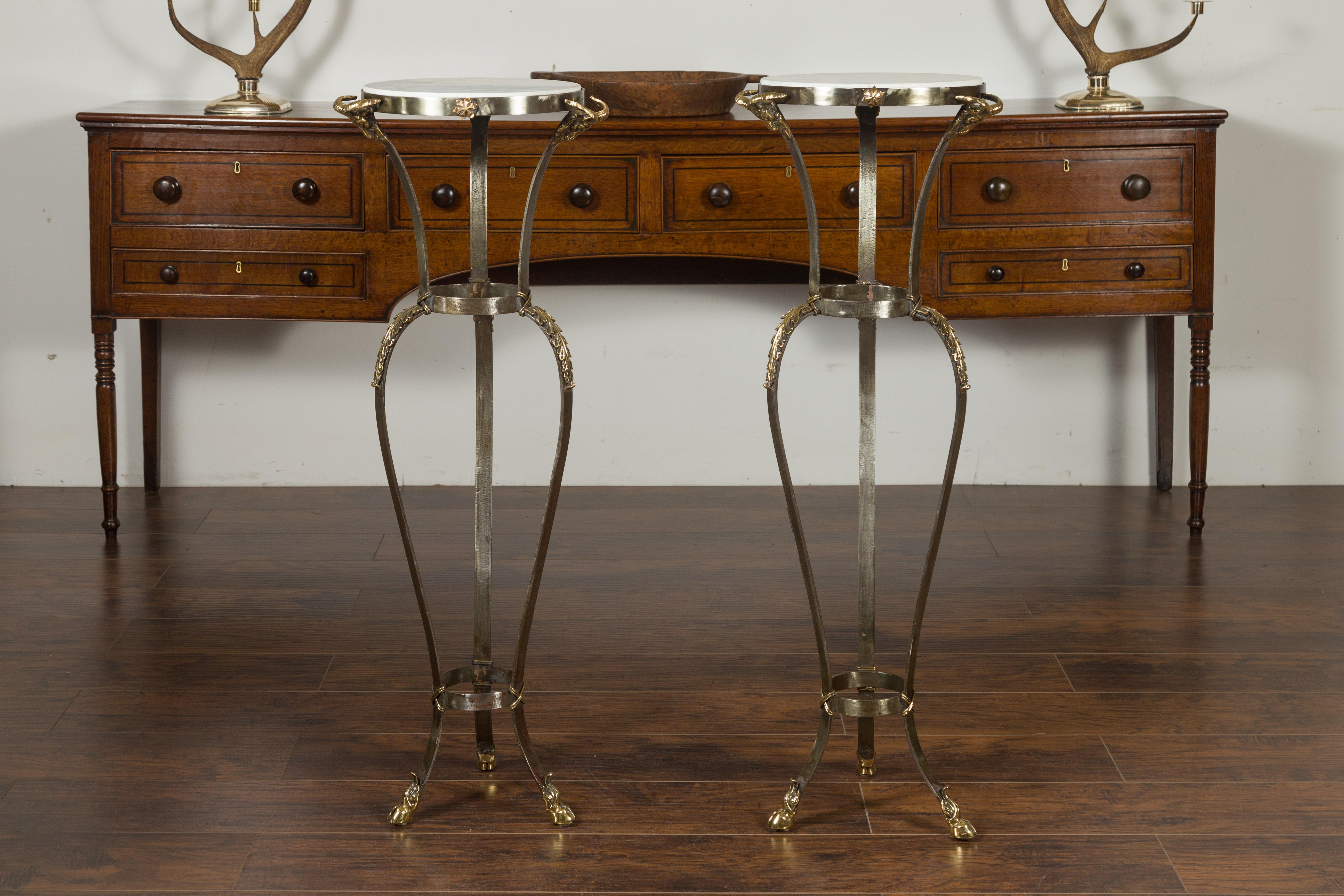 Mid-Century Modern Pair of Italian Steel and Brass Pedestals with Marble Tops and Ram's Heads For Sale